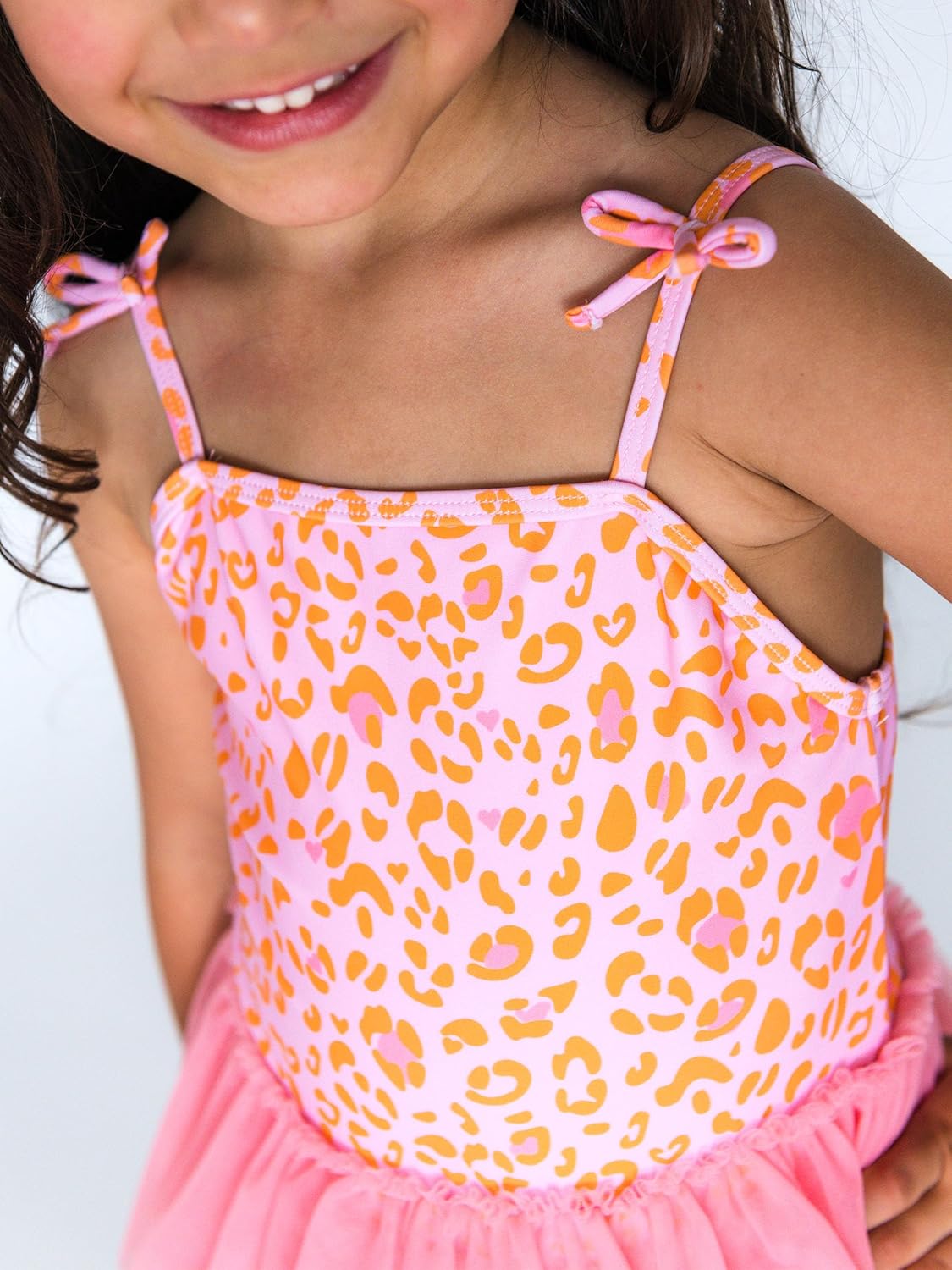 RuffleButts Girls UPF50+ Sun Protection Peplum Smocked Bodice/Tulle Skirted One Piece Swimsuit