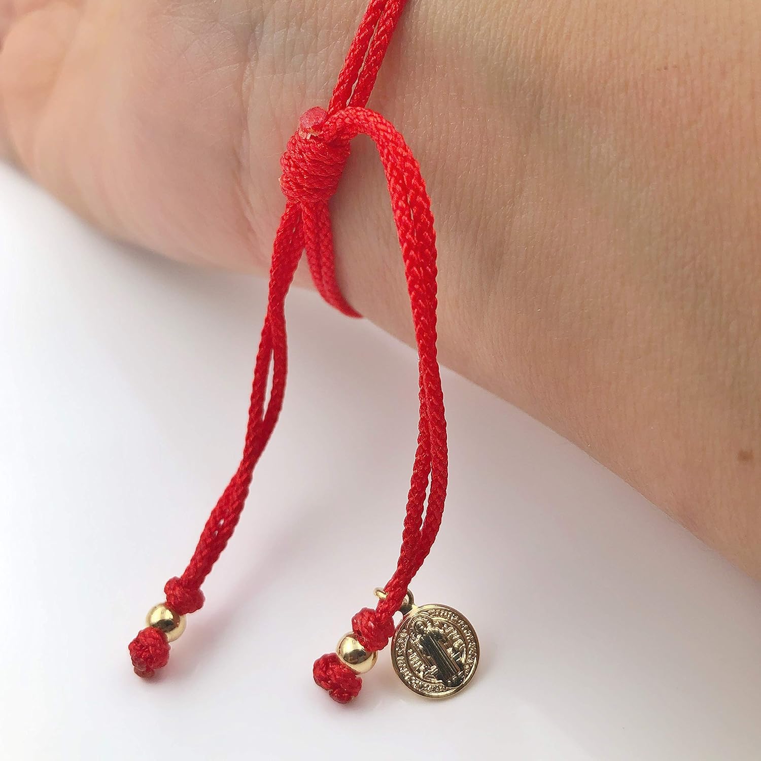 St Benedict Coin Medal on Adjustable Red Cord Wrist Adjustable Bracelet - Image 3