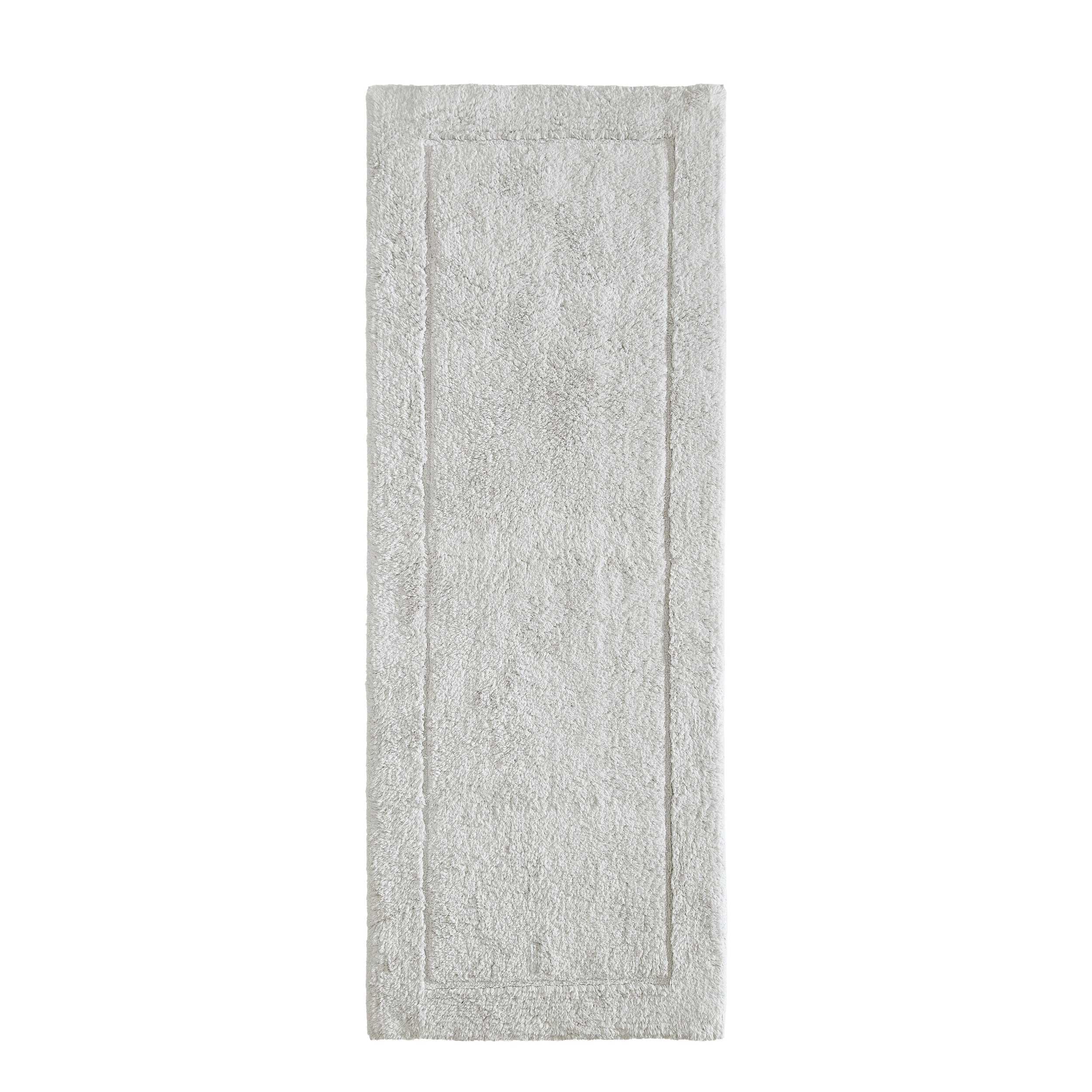 Tapis absorbant Calvin Klein doux et moderne pour salle de bain