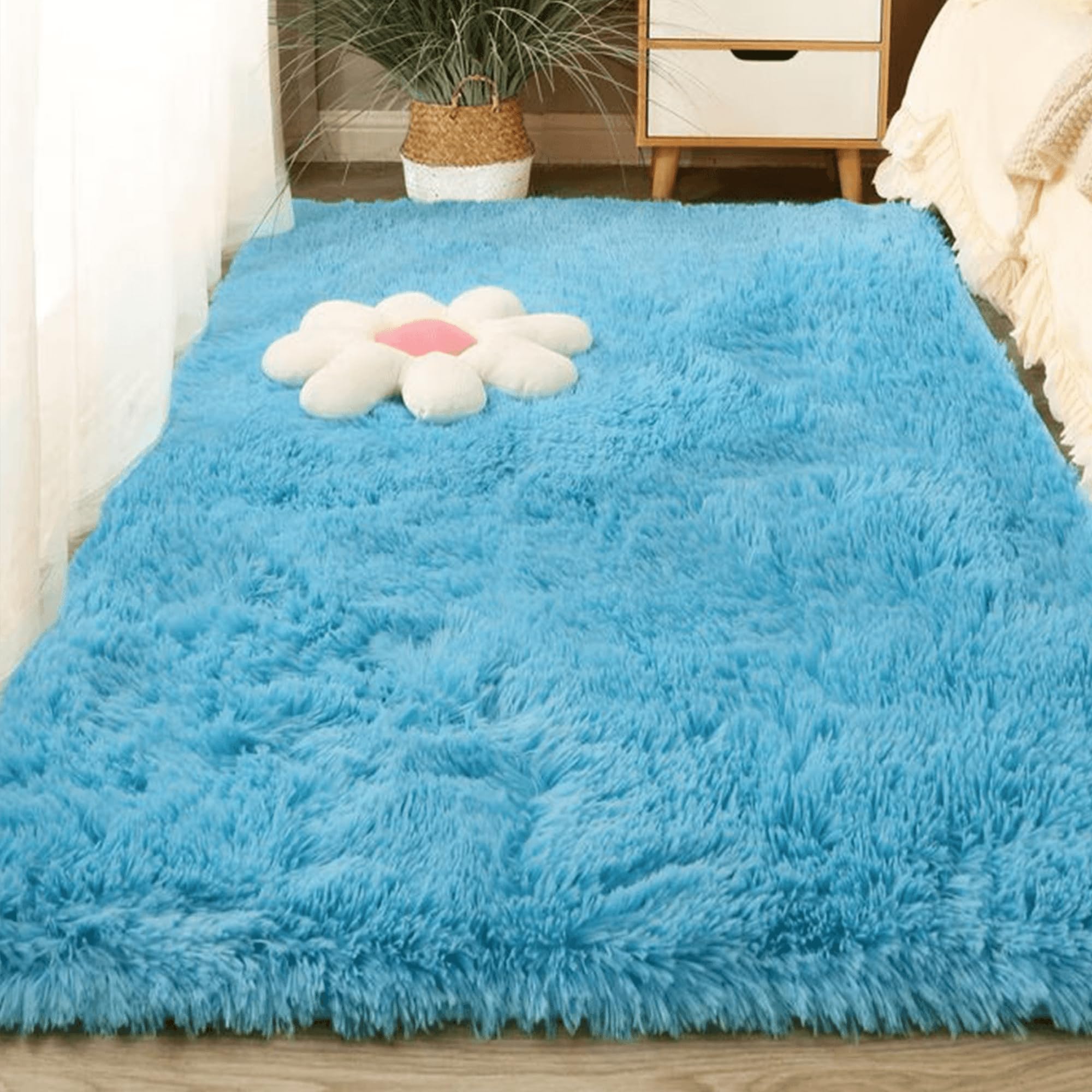 Tapis de salon moelleux bleu antidérapant pour éviter les glissades sur le parquet du salon