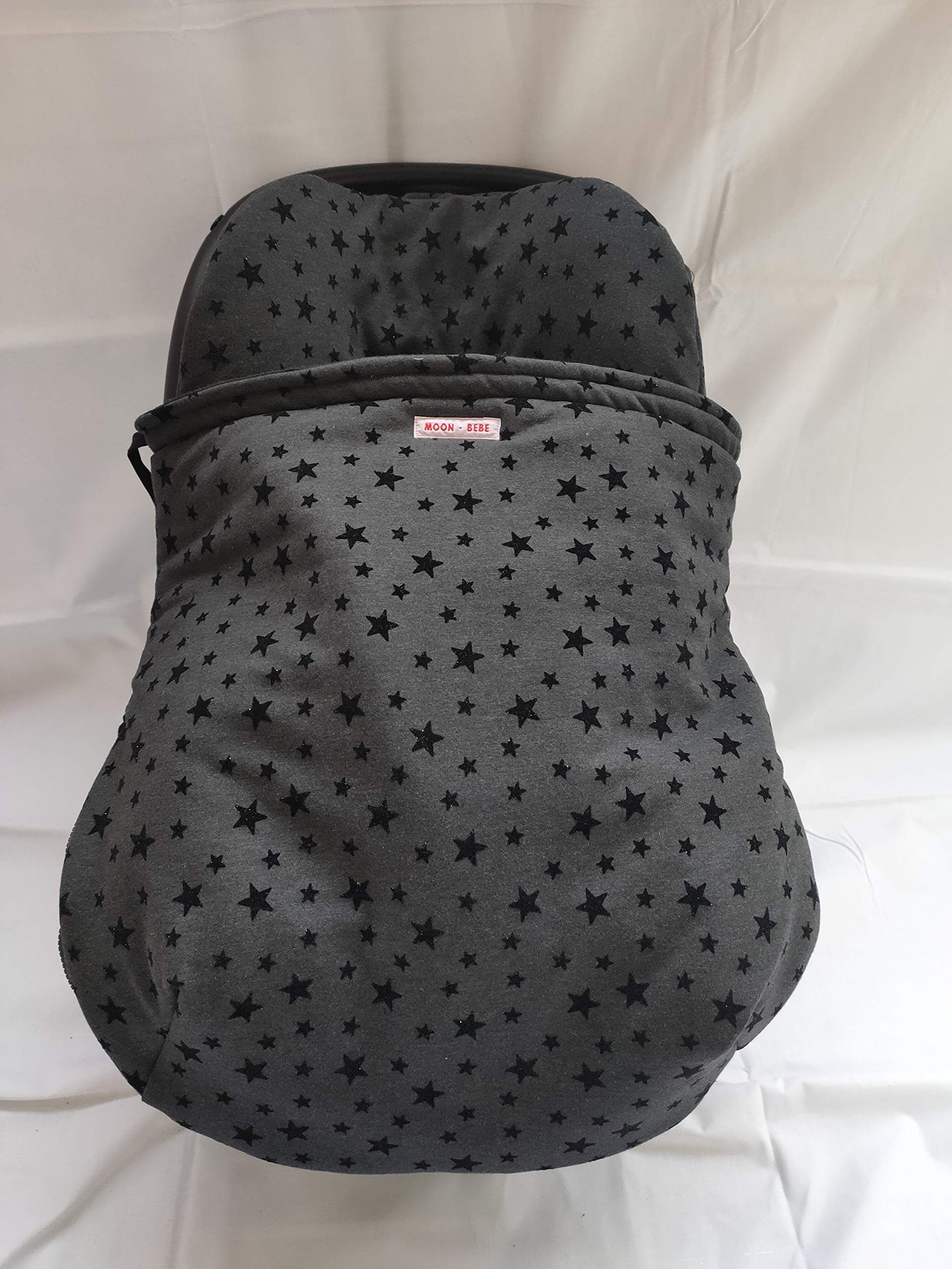 Couverture chancelière pour siège auto protégeant le bébé du froid sans glisser