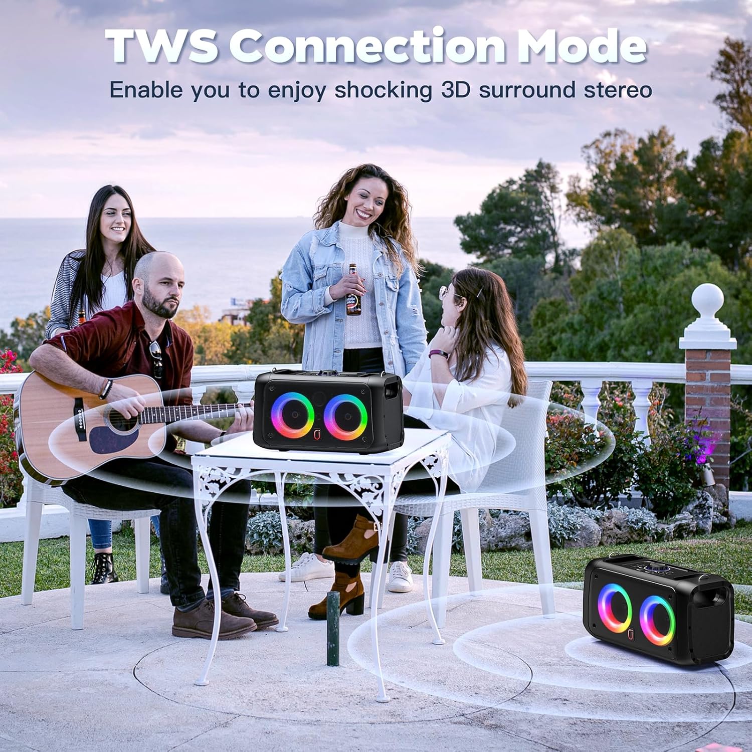 Two HWWR Karaoke Machine T22-T speakers connected via TWS function, placed on an outdoor patio table with people enjoying music, illustrating 3D surround sound.