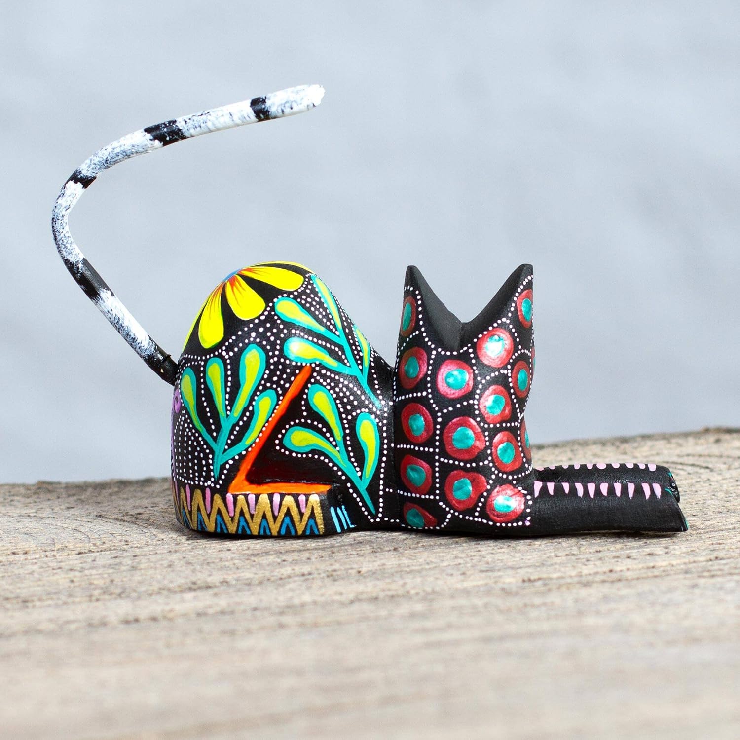 NOVICA Artisan Handmade Wood Alebrije Sculpture Copal Floral Black Cat from Mexico Multicolor Painted Hacienda Folk Art [3.9in H x 4.3in W x 1.4in D] ' Excited Black Cat'