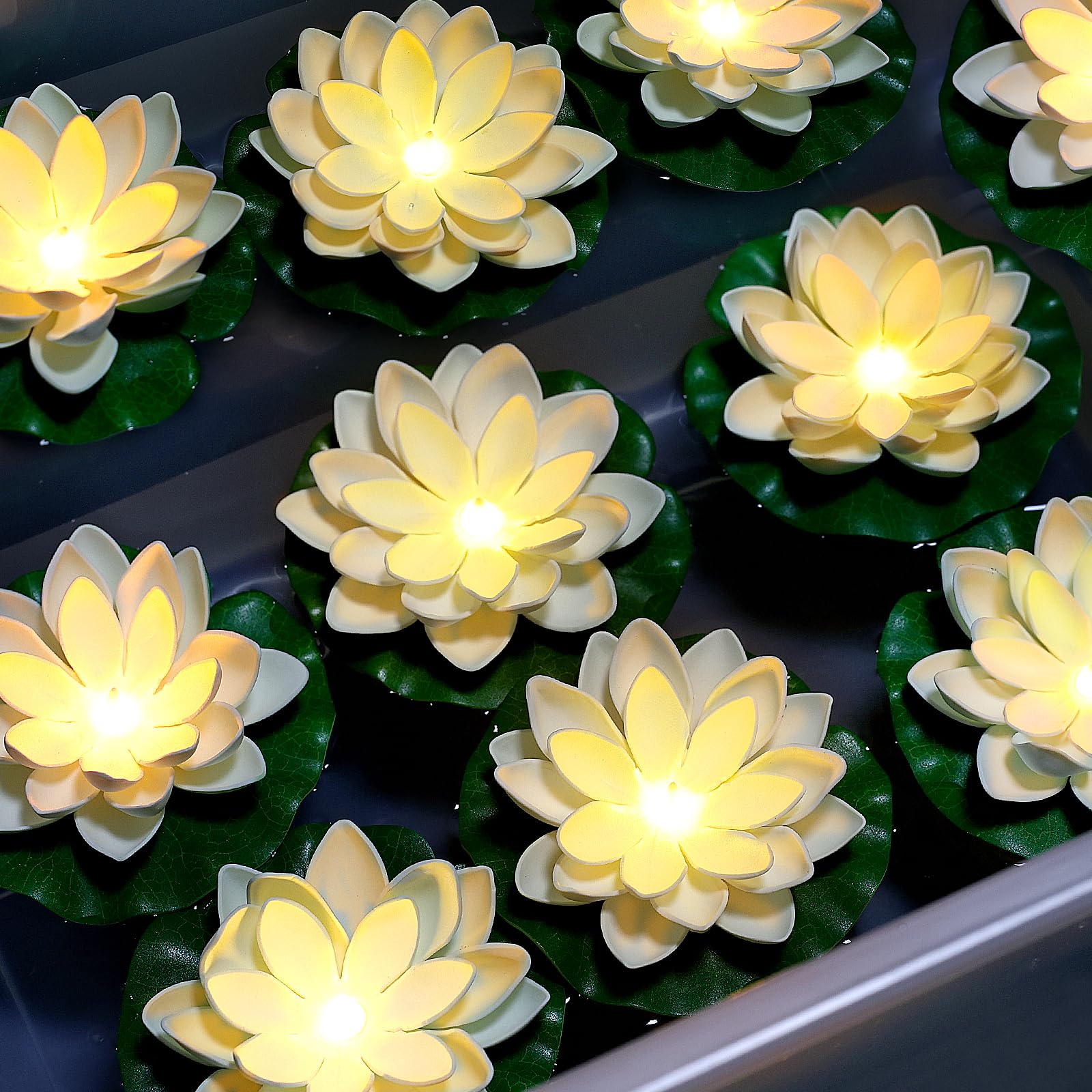 Photo 1 of Scawim 12PCS Floating Lotus Light, 5 Inch, Water Activated, Warm White