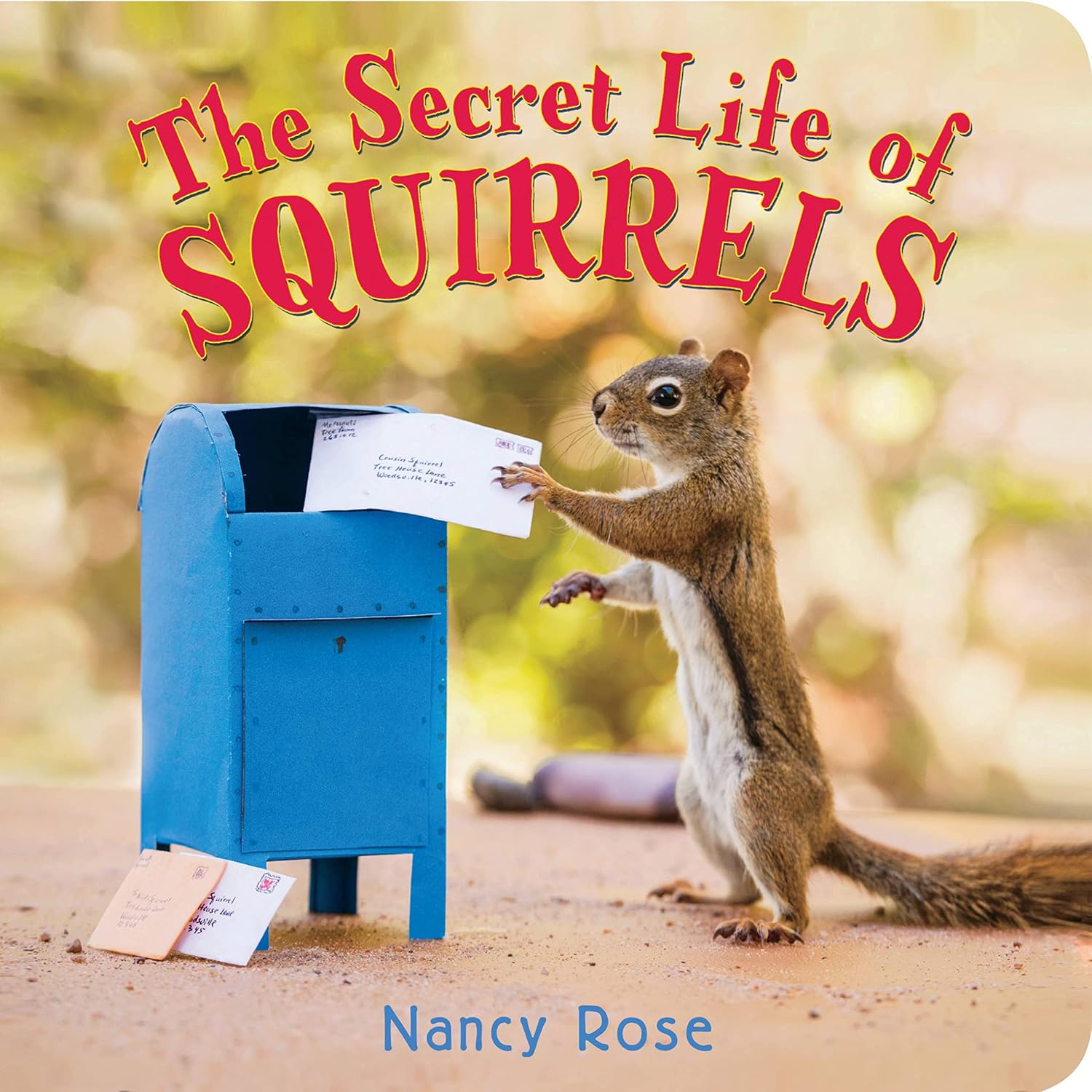 Cover of The Secret Life of Squirrels showing a squirrel at a miniature scene