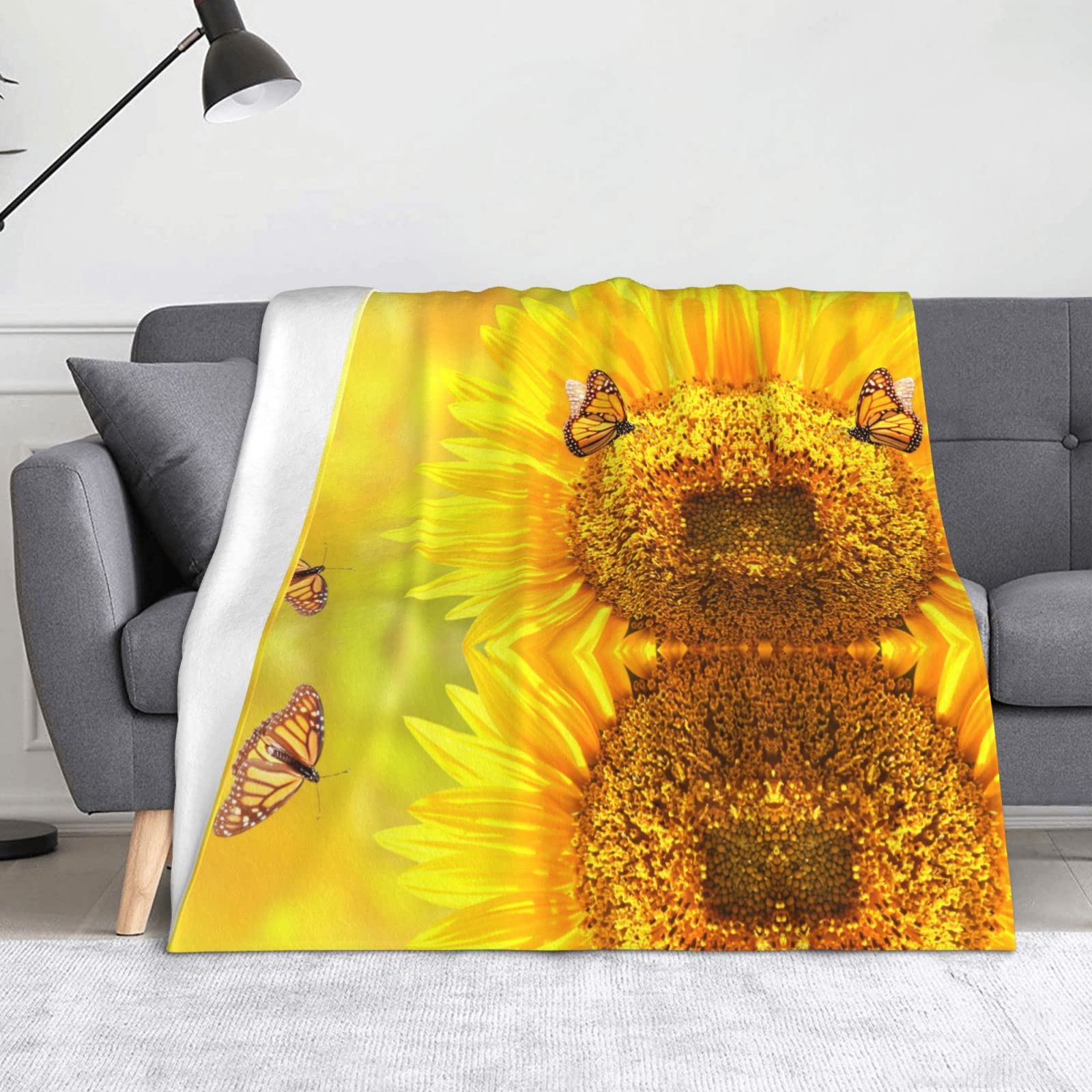 Couverture flanelle tournesol contre le froid sur le canapé