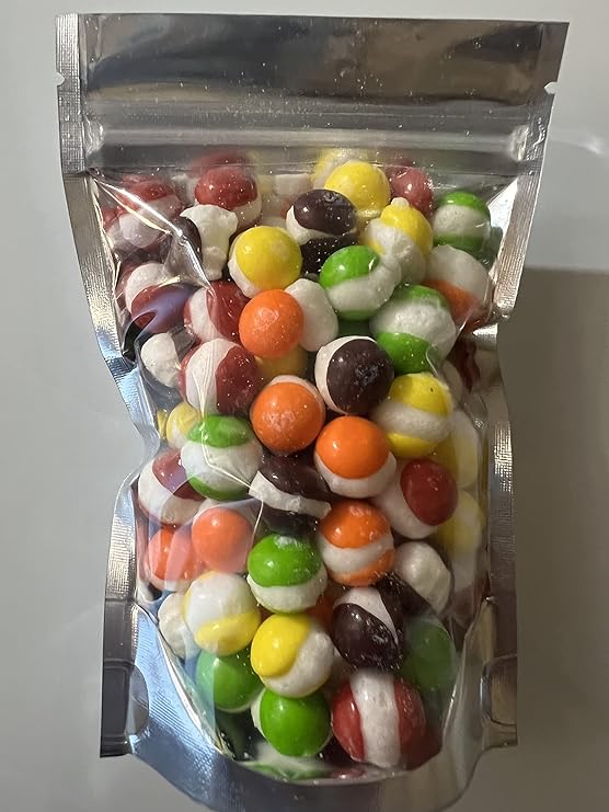 Serenity Farmz Freeze Dried Skittlez Puff Candy Hand