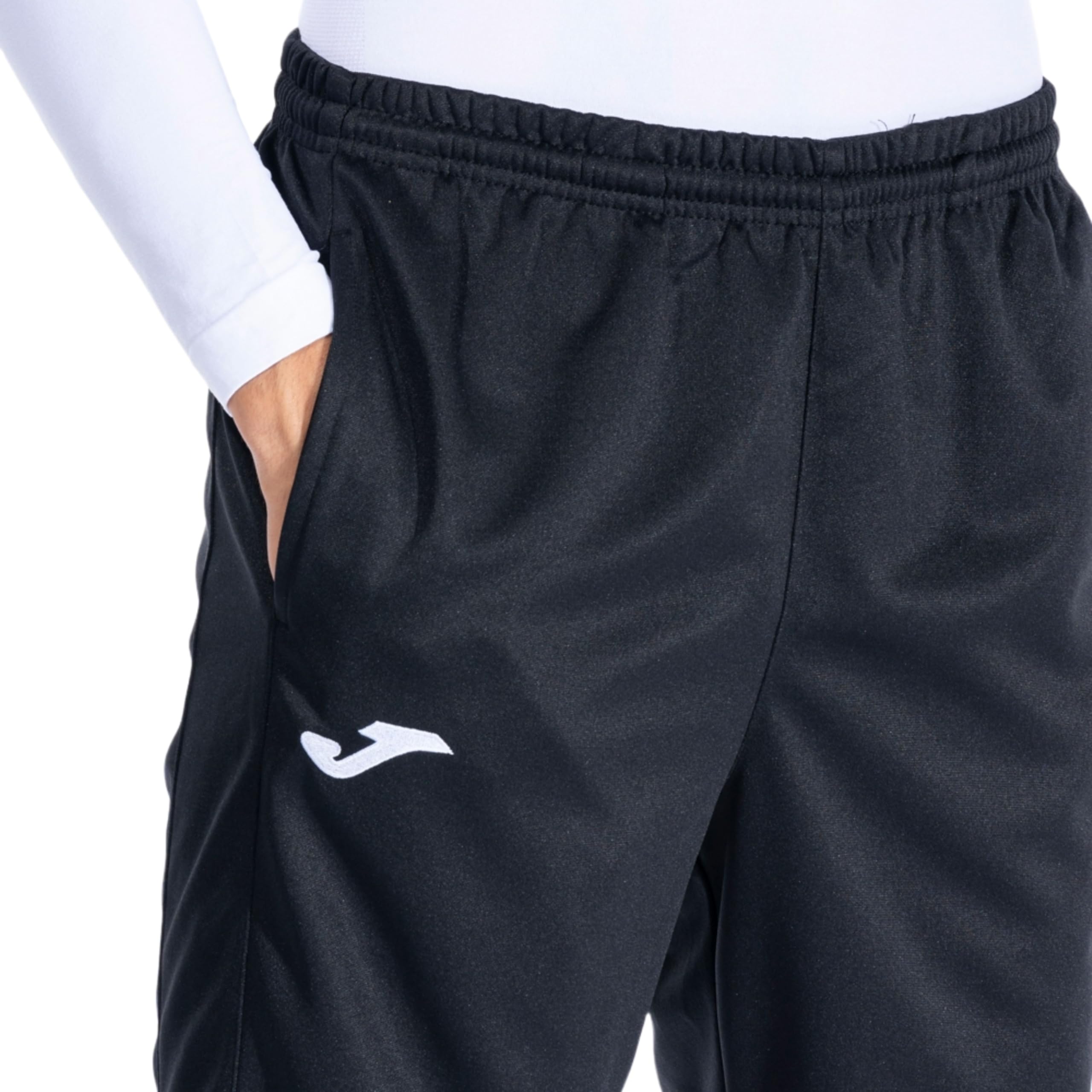 Joma - Pantalón Largo Deportivo Hombre, 5XS - 3XL - Bolsillos, Cintura Elástica con Cordón y Bajo con Cremallera - Championship IV - 3