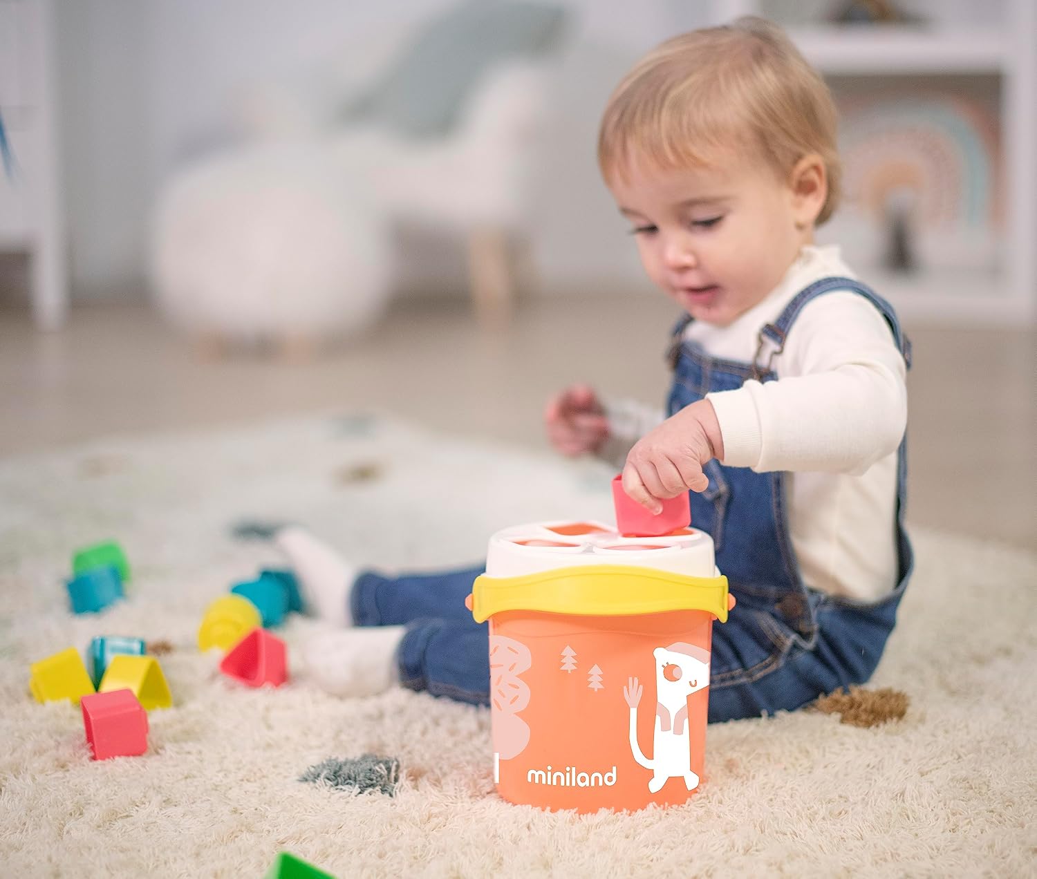 Miniland Feel to Learn Salmon Shape Sorting Bucket for Children from 1 to 2 Years. 16 Multicolored Pieces with Different Shapes. Made in Spain with ECO Materials