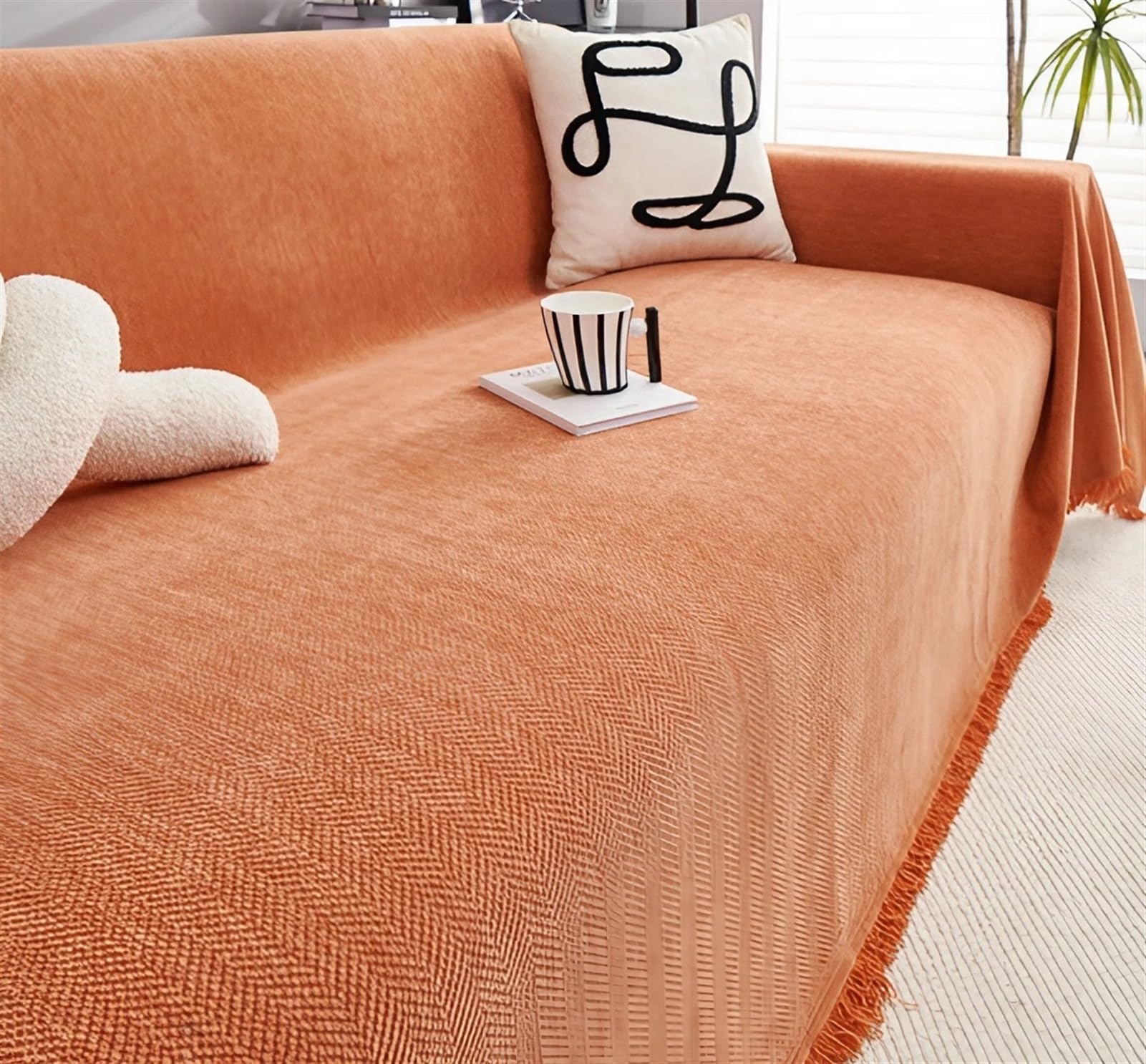 Plaid chevrons orange 180cm pour réchauffer vos soirées au salon