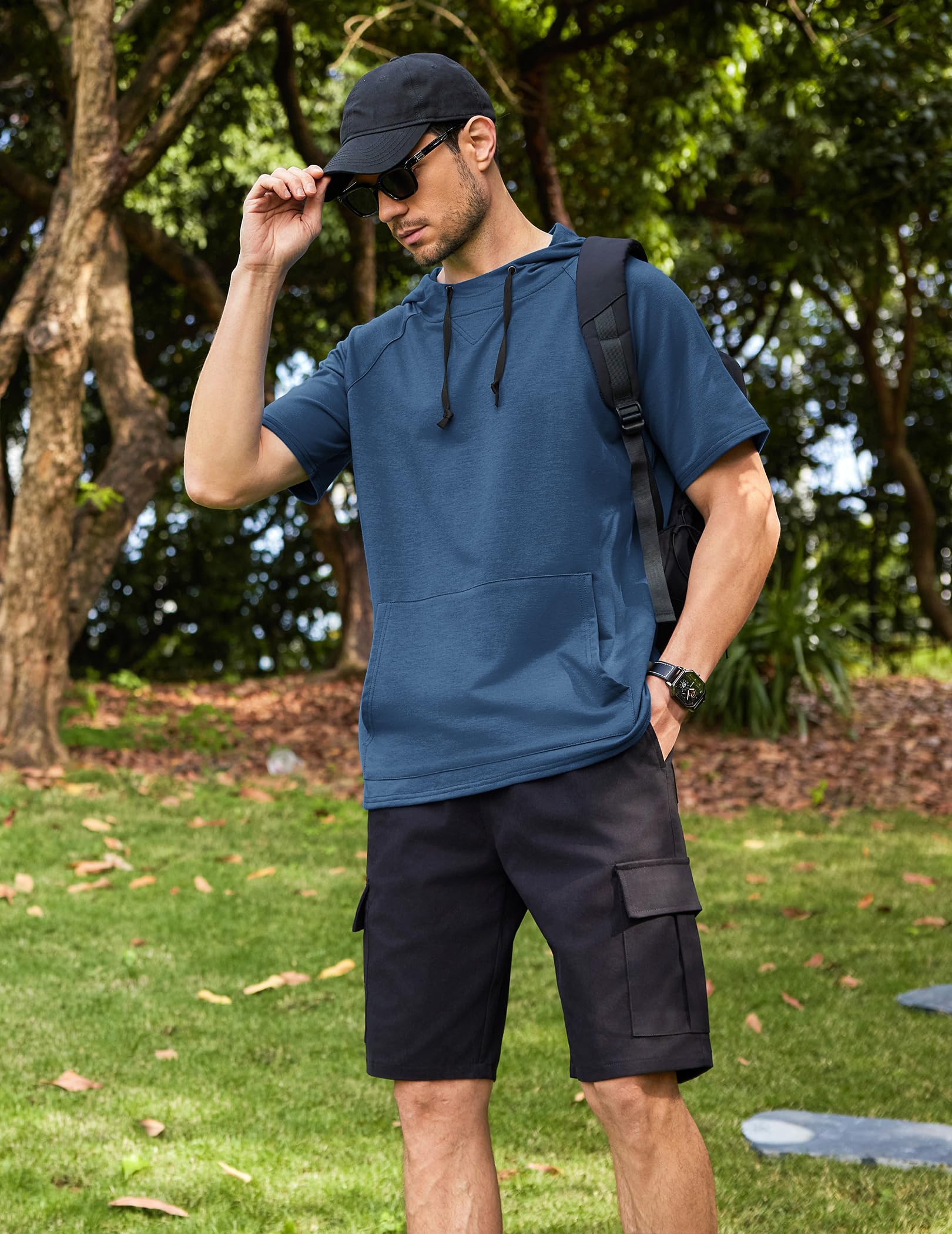 COOFANDY Sudadera con Capucha de Manga Corta para Hombre Camiseta Deportiva con Bolsillo Canguro Estilo Urbano y Fitness para Gym Running y Verano Casual Azul M