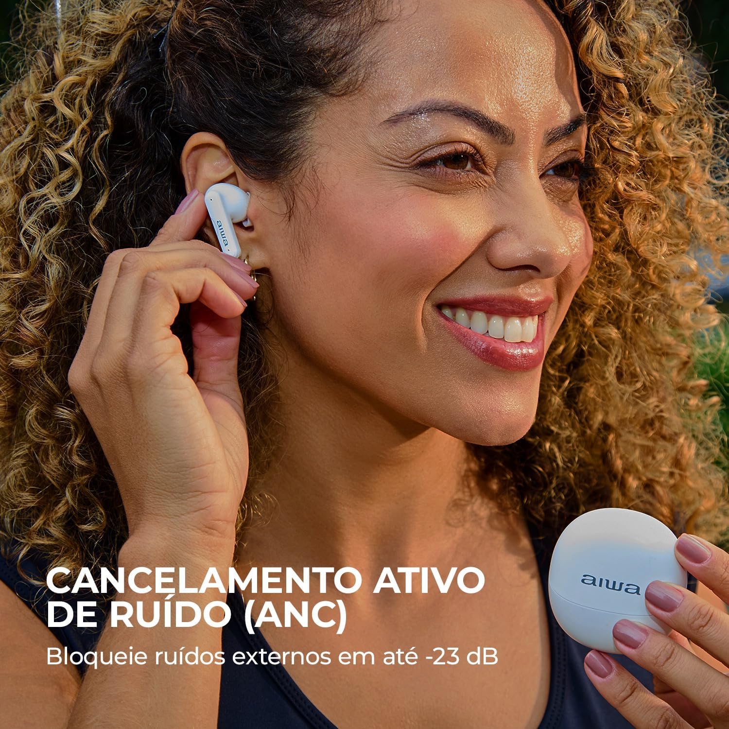 Woman using AIWA earbuds with ANC feature