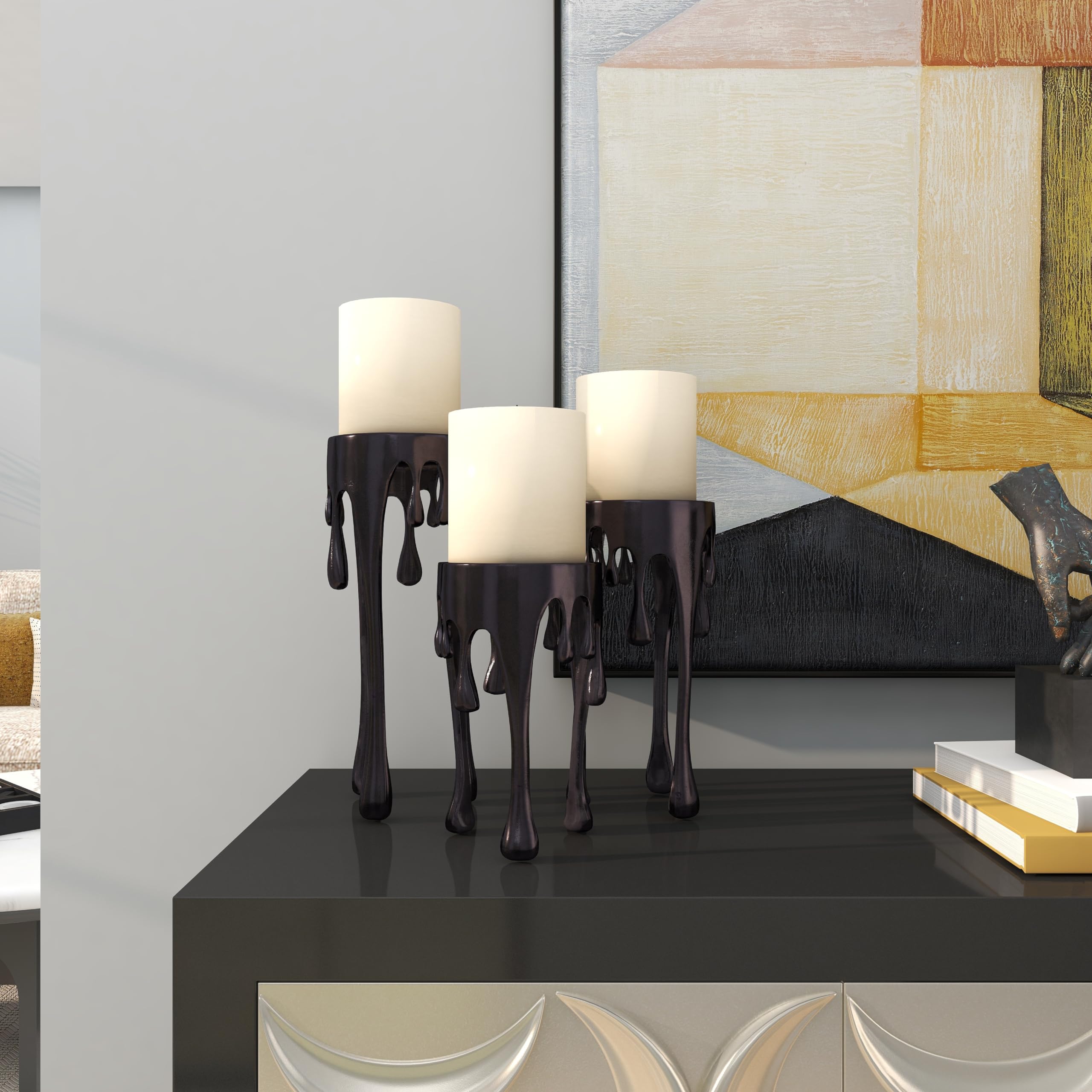 CosmoLiving by Cosmopolitan Aluminum Metal Decorative Candle Holder Pillar Candle Stand with Dripping Melting Designed Legs, Set of 3 Candlestick Holder 12", 10", 8"H,: Black