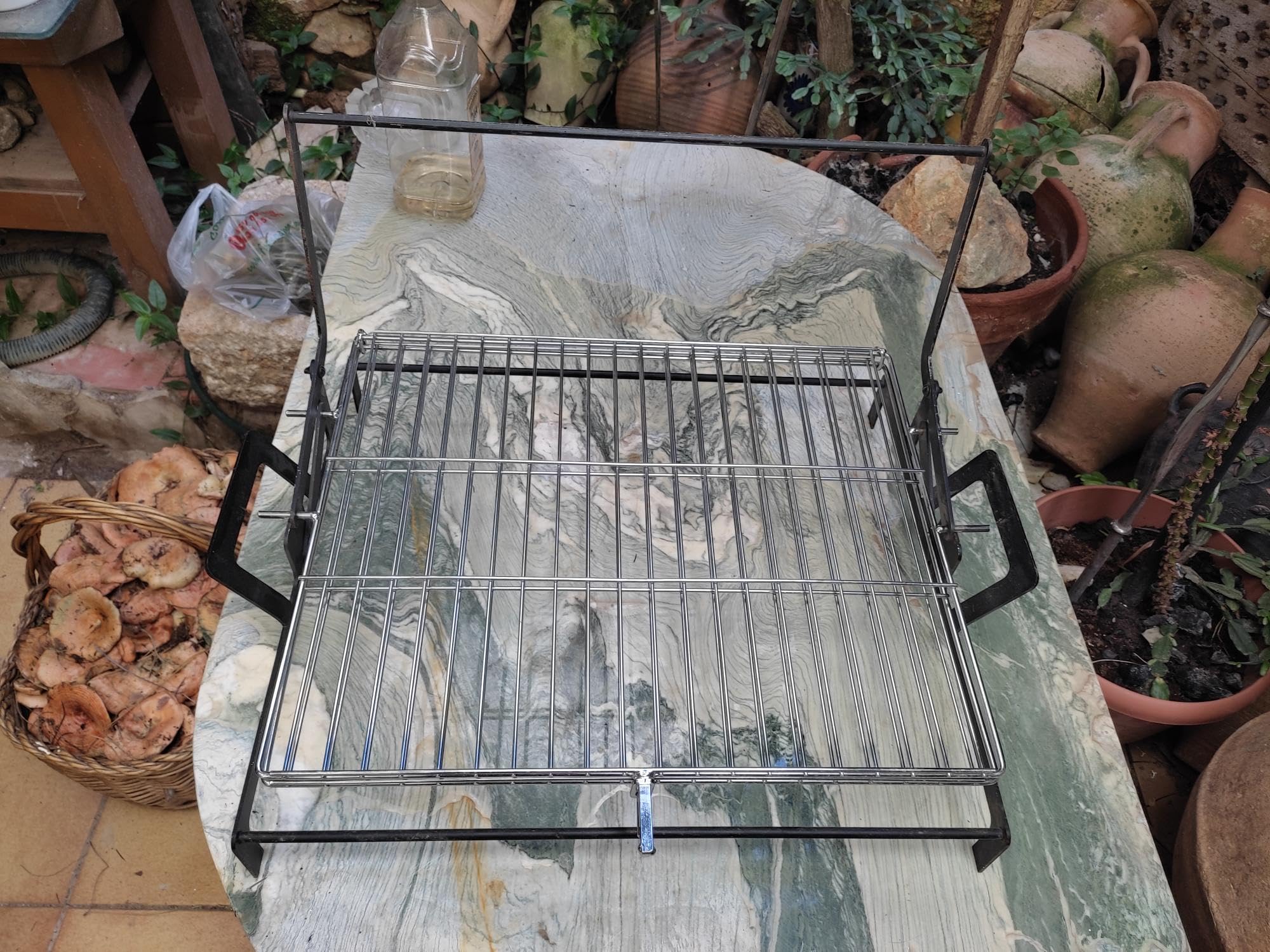 Grille rotative portable en acier robuste pour cuisson uniforme