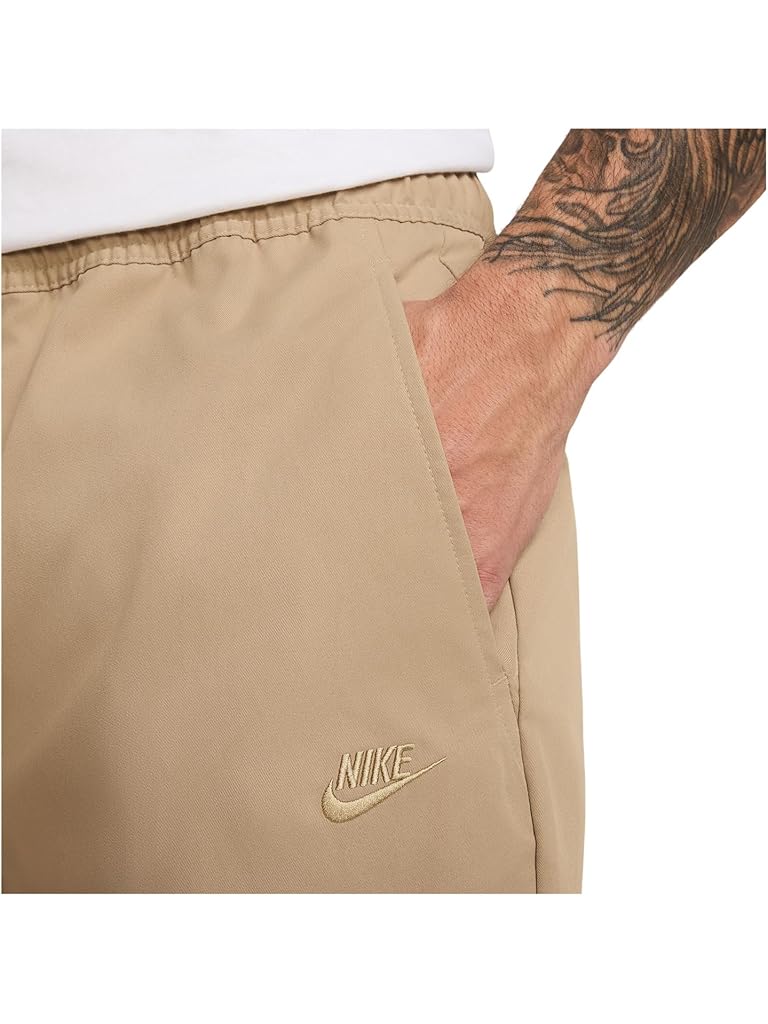 Beige Nike Club Woven Taper Pants