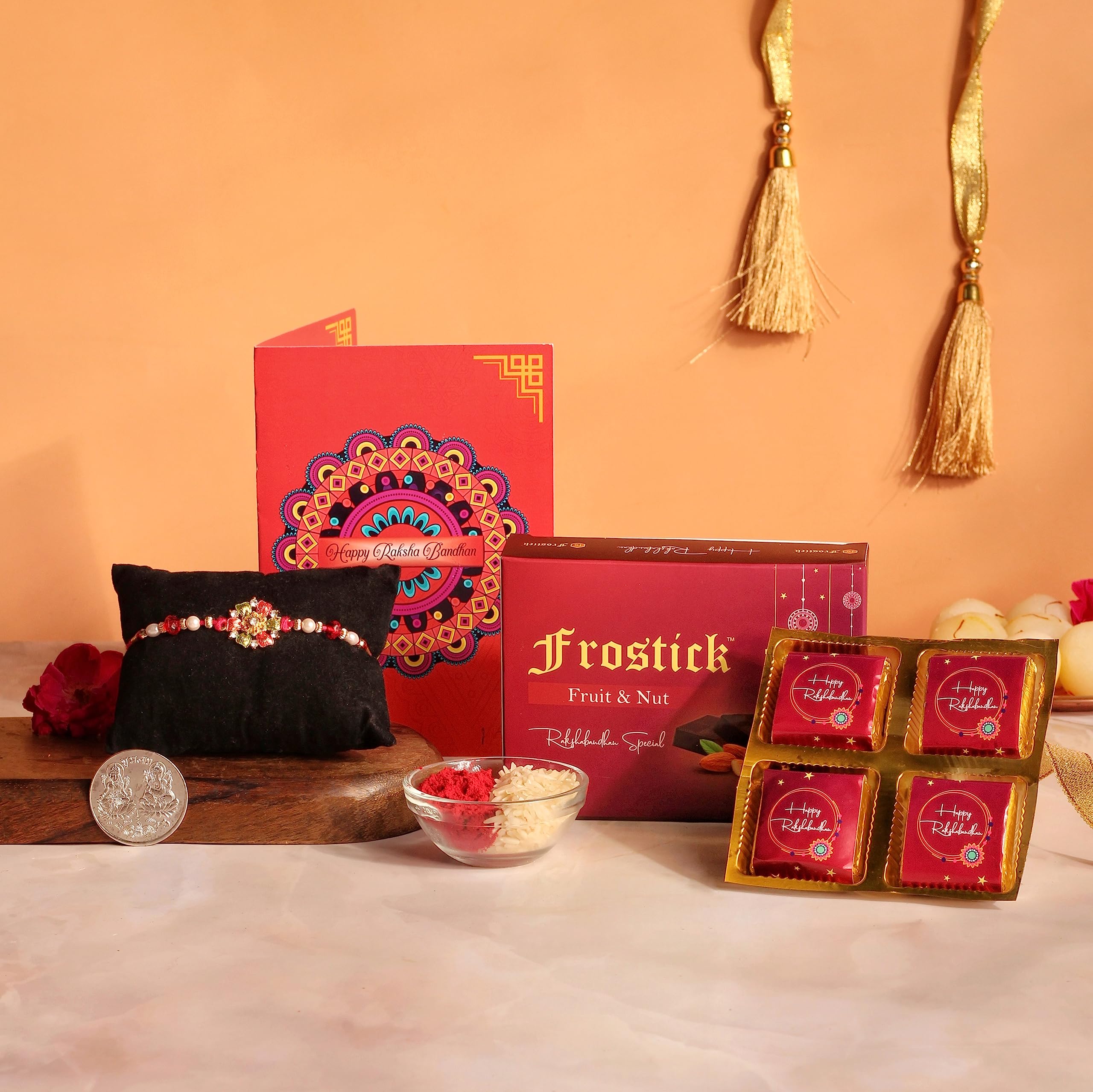 Frostick Designer Rakhi With Pack Of 4 Handmade Chocolates - Set Of 1 Designer Rakhi With Chocolate, Greeting Card, Tilak Chawal & Silver Coin For Brother/Bhai/Bhaiya, 80 Gm (B0C6H1HMCD) Amazon Price History, Amazon Price Tracker