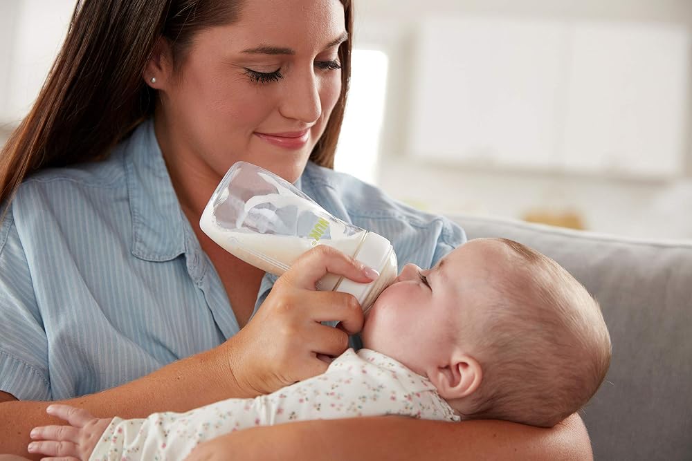 NUK Simply Natural Giftset with SafeTemp and Anti-Colic Vent Bottles for Natural Feeding, Includes 9 Pieces