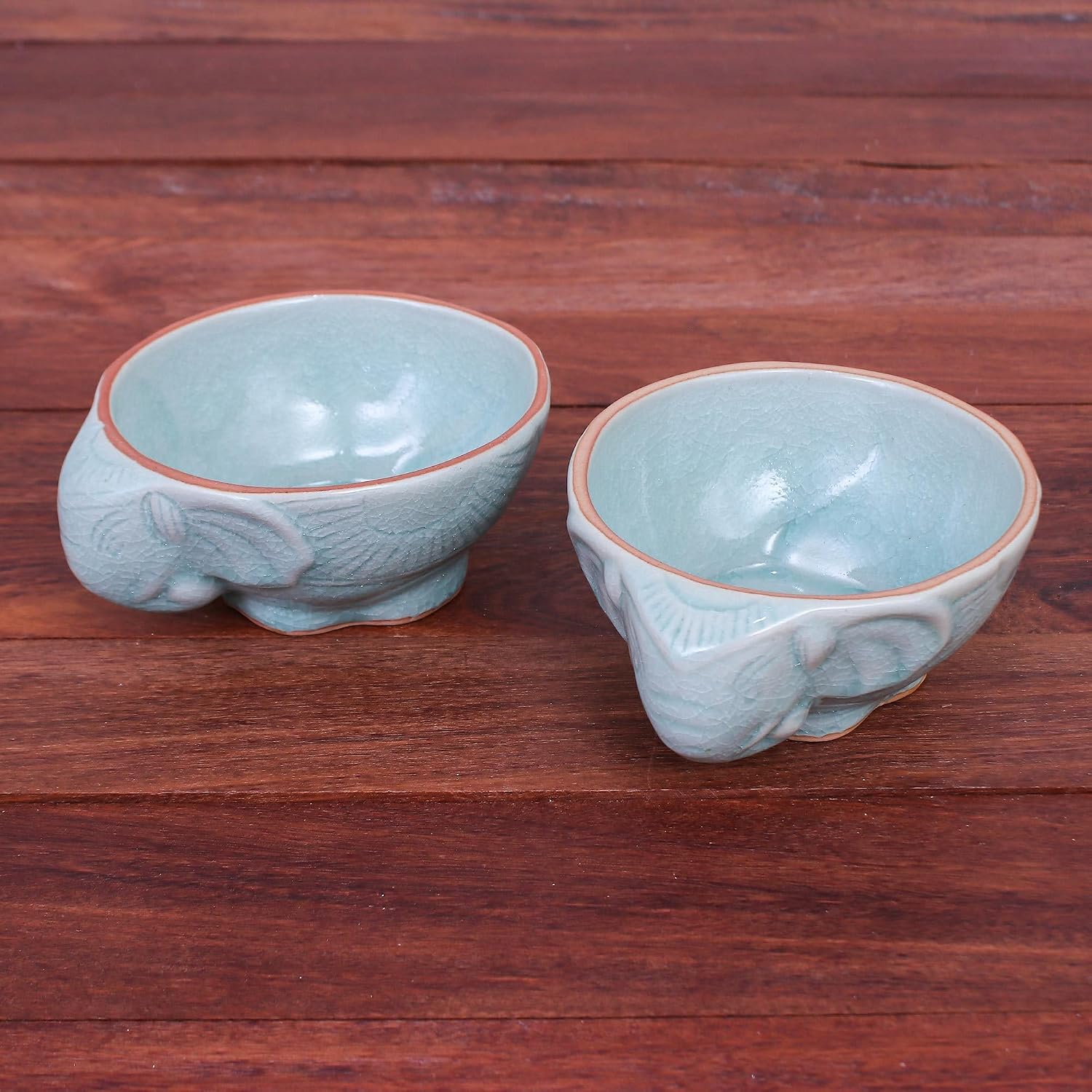 NOVICA Artisan Handmade Celadon Ceramic Bowls Aqua Elephant Motif Pair Green Thailand Tableware Dinnerware Animal Themed [ 2.6in H x 6.25in W x 5.25in D 10 Oz.] ' Elephant Companion in Aqua' Pair