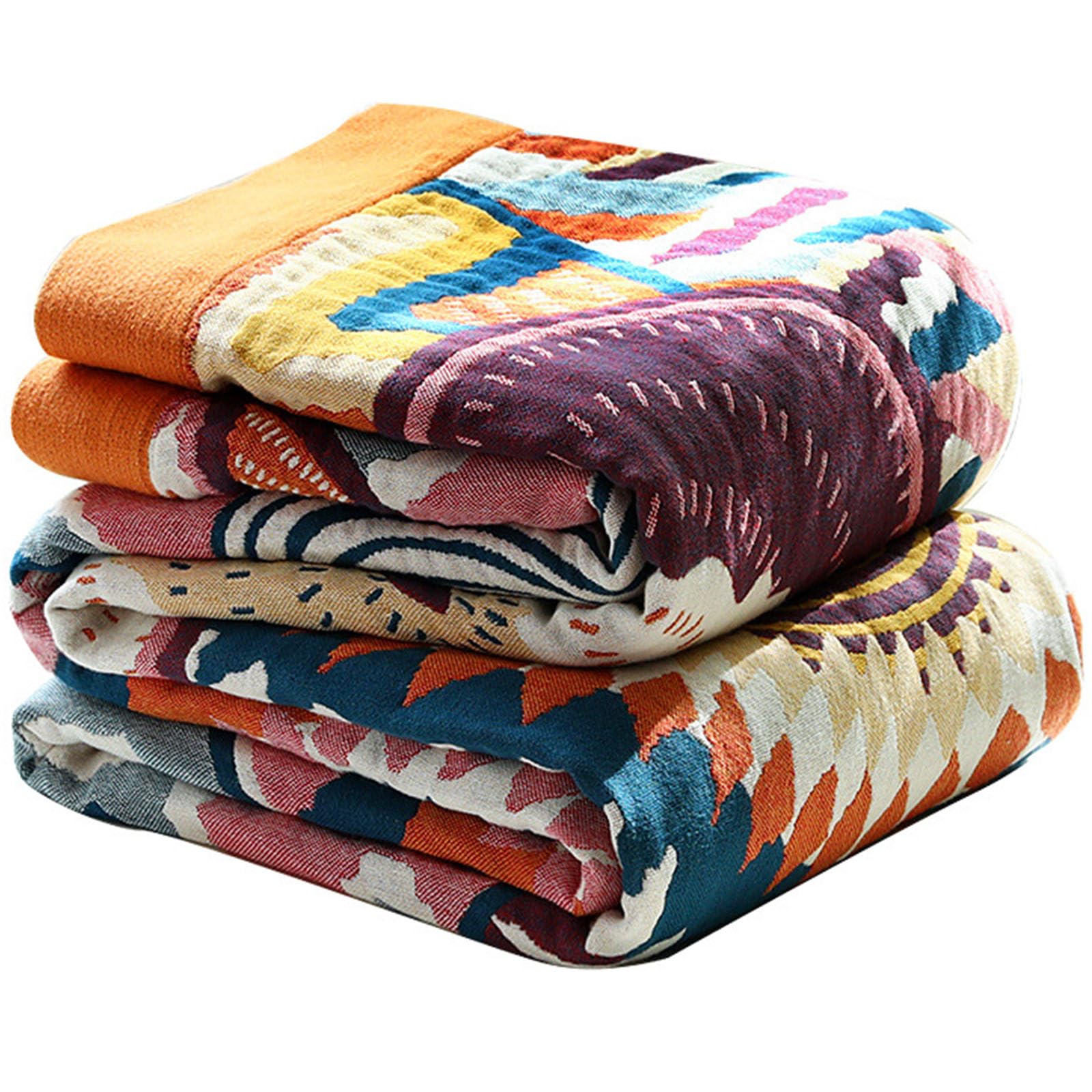 Couverture cocooning pour canapé et lit : le confort douillet du pur coton