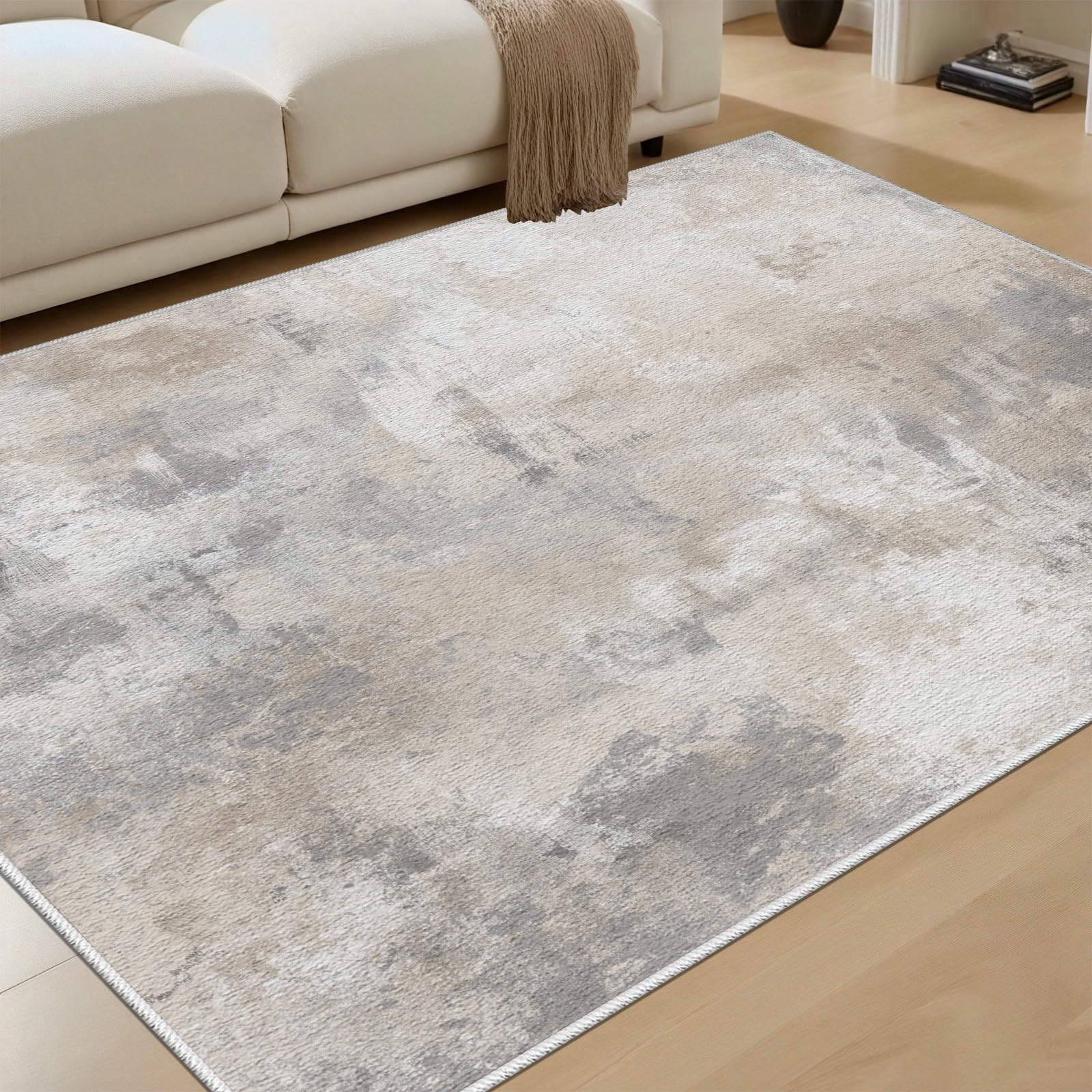 Tapis de salon beige 140x200cm lavable en machine et antidérapant au design moderne abstrait
