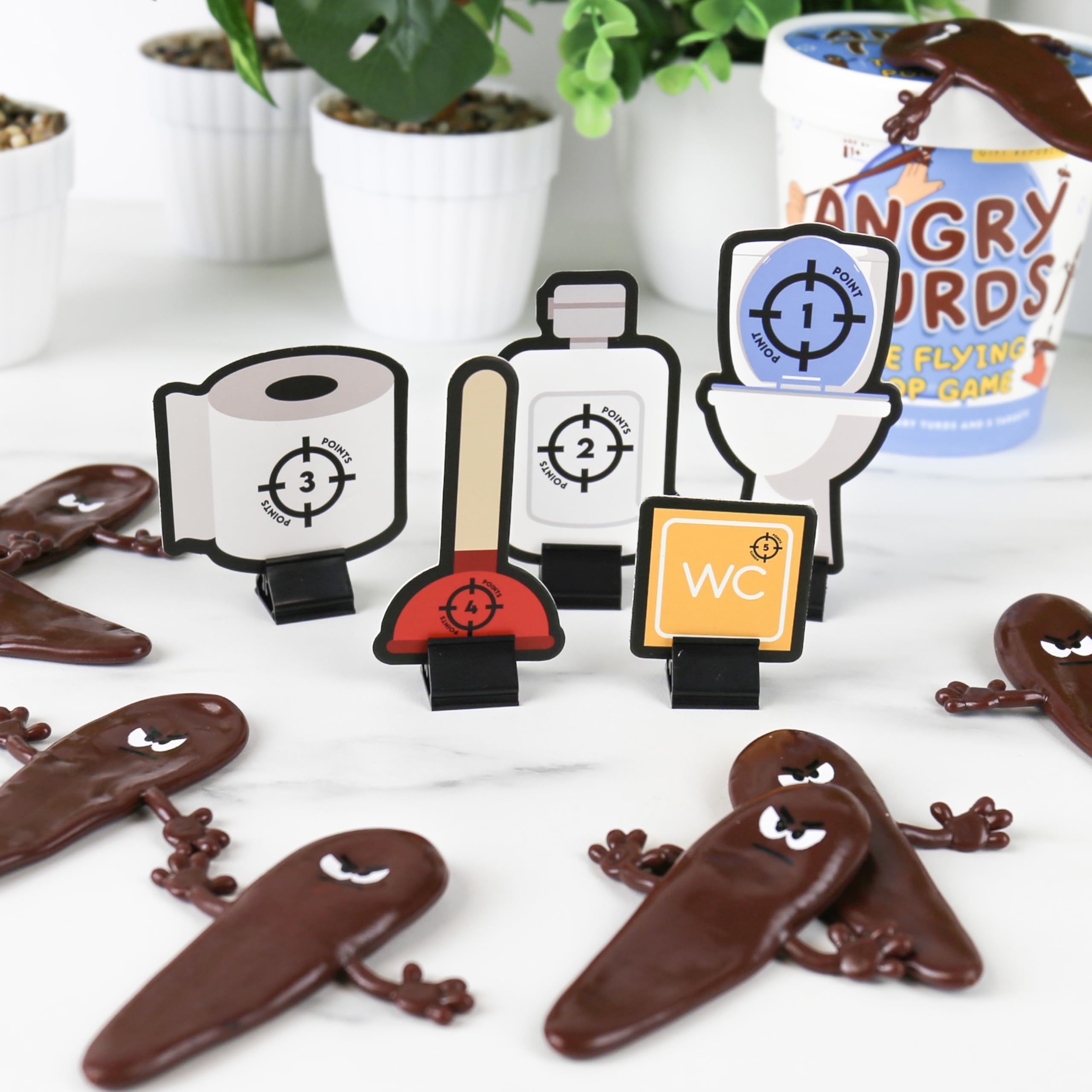 Angry Turds – Flying Poop Sling Shot Game for Kids & Families | Funny Party Game with 10 Sticky Turds & 5 Targets | Silly Toilet Humour Gift | Ages 6+