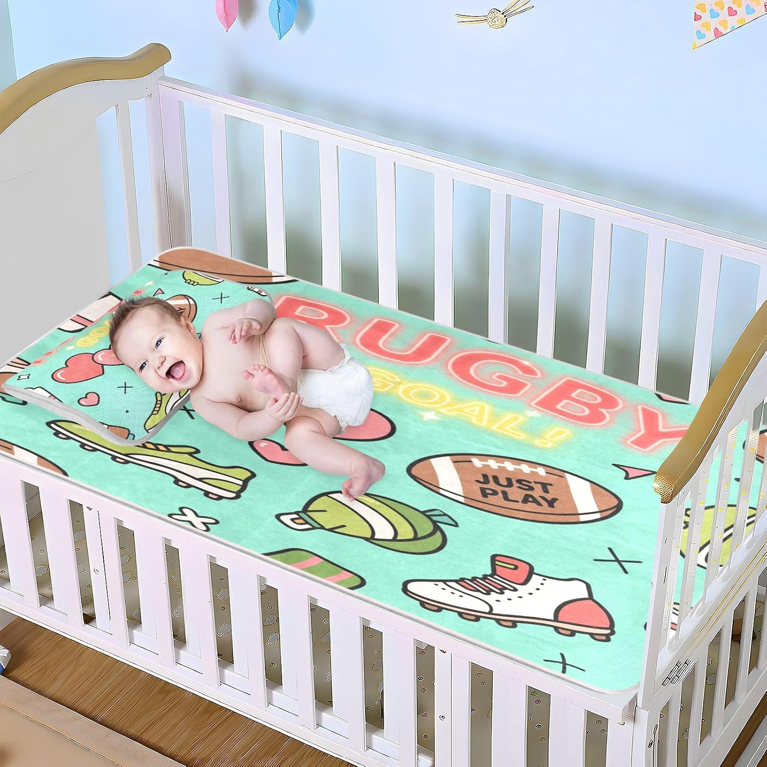 Cooling Baby Mattress - 28" x 52" Absorbent Rugby Ball with Green Heart Pattern - Bed Pads for Infants and Toddlers