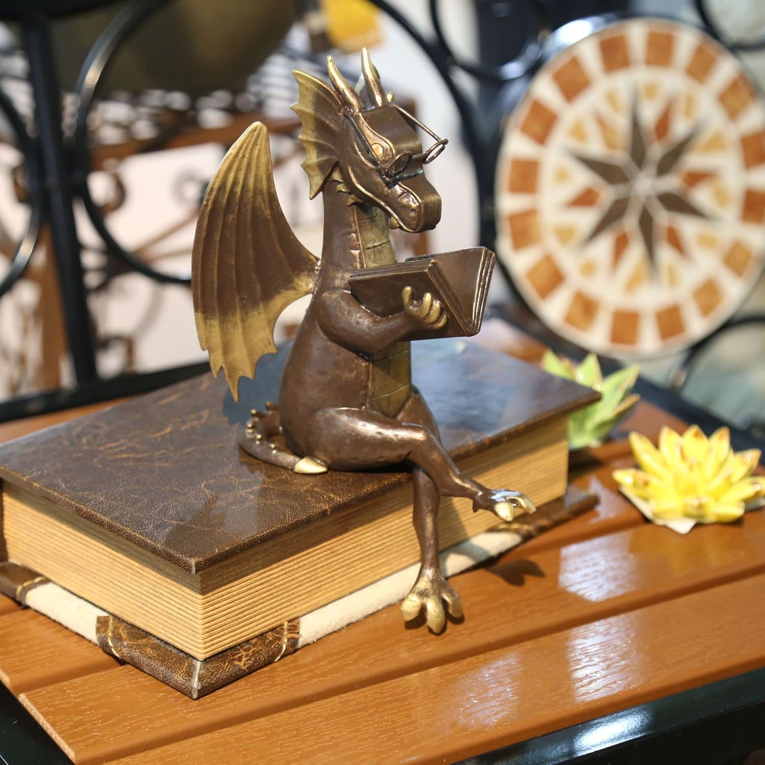small dragon reading figurine