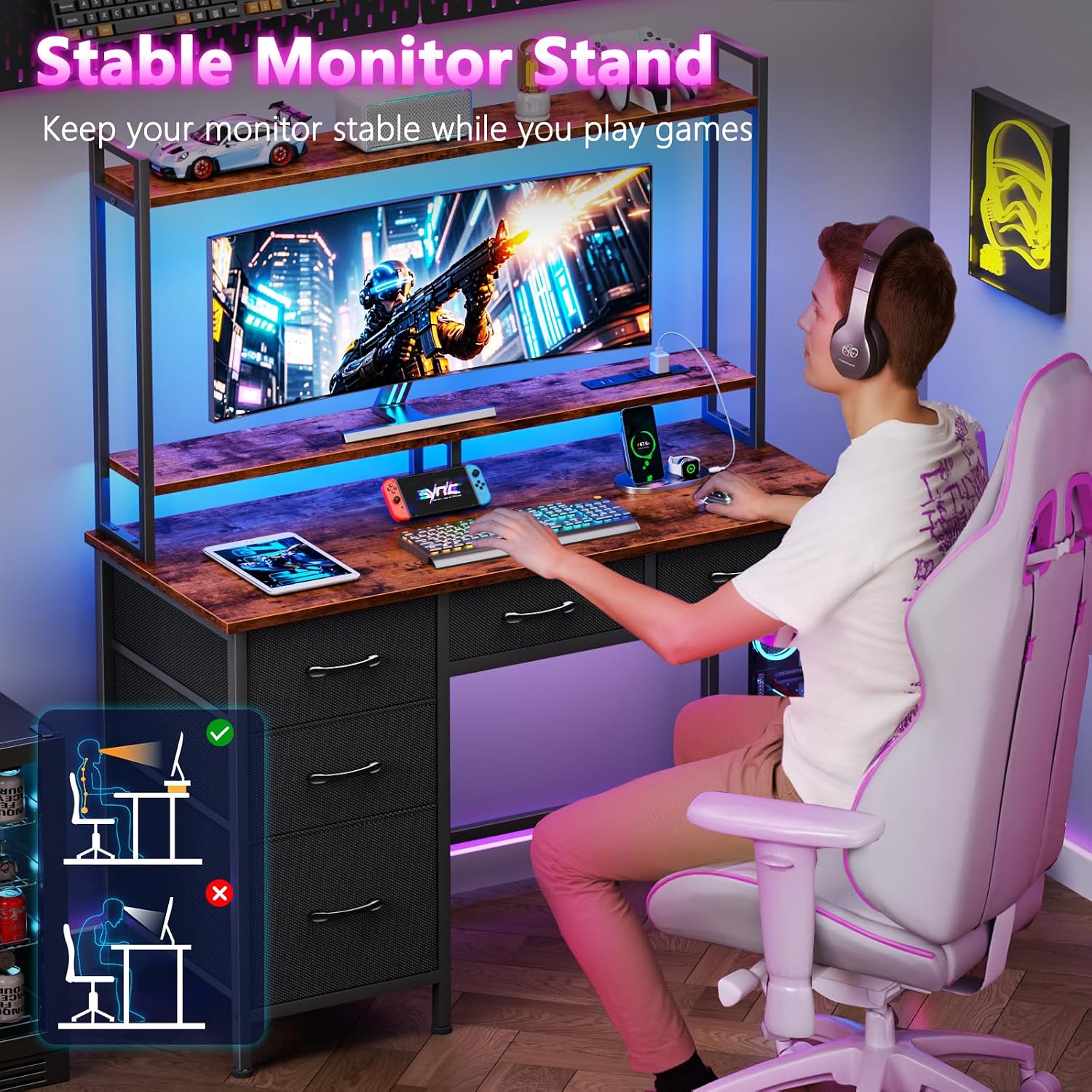 A person sitting at the Korfile desk with a monitor on the hutch, demonstrating ergonomic posture.