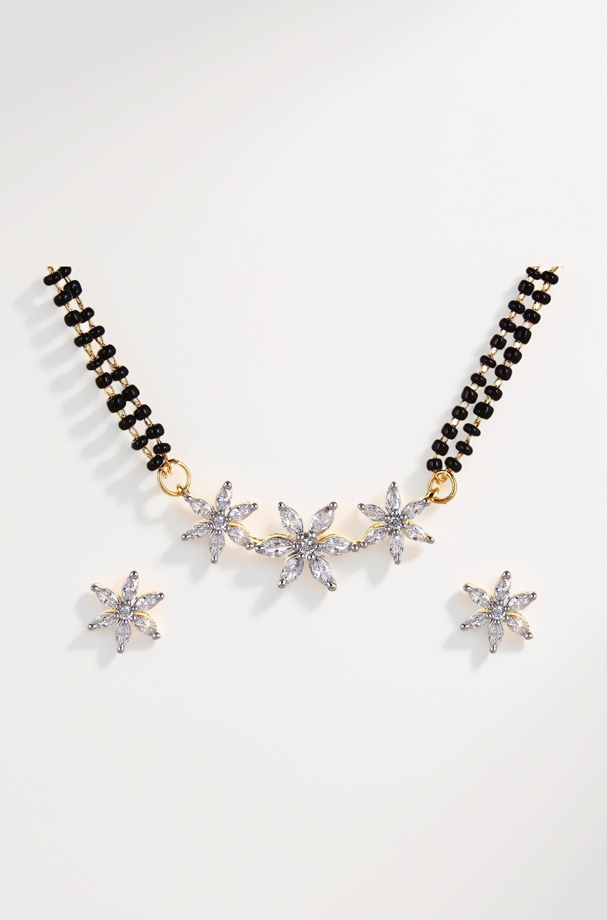 YouBella American Diamond Gold Plated Mangalsutra Pendant with Chain and Earrings for Women