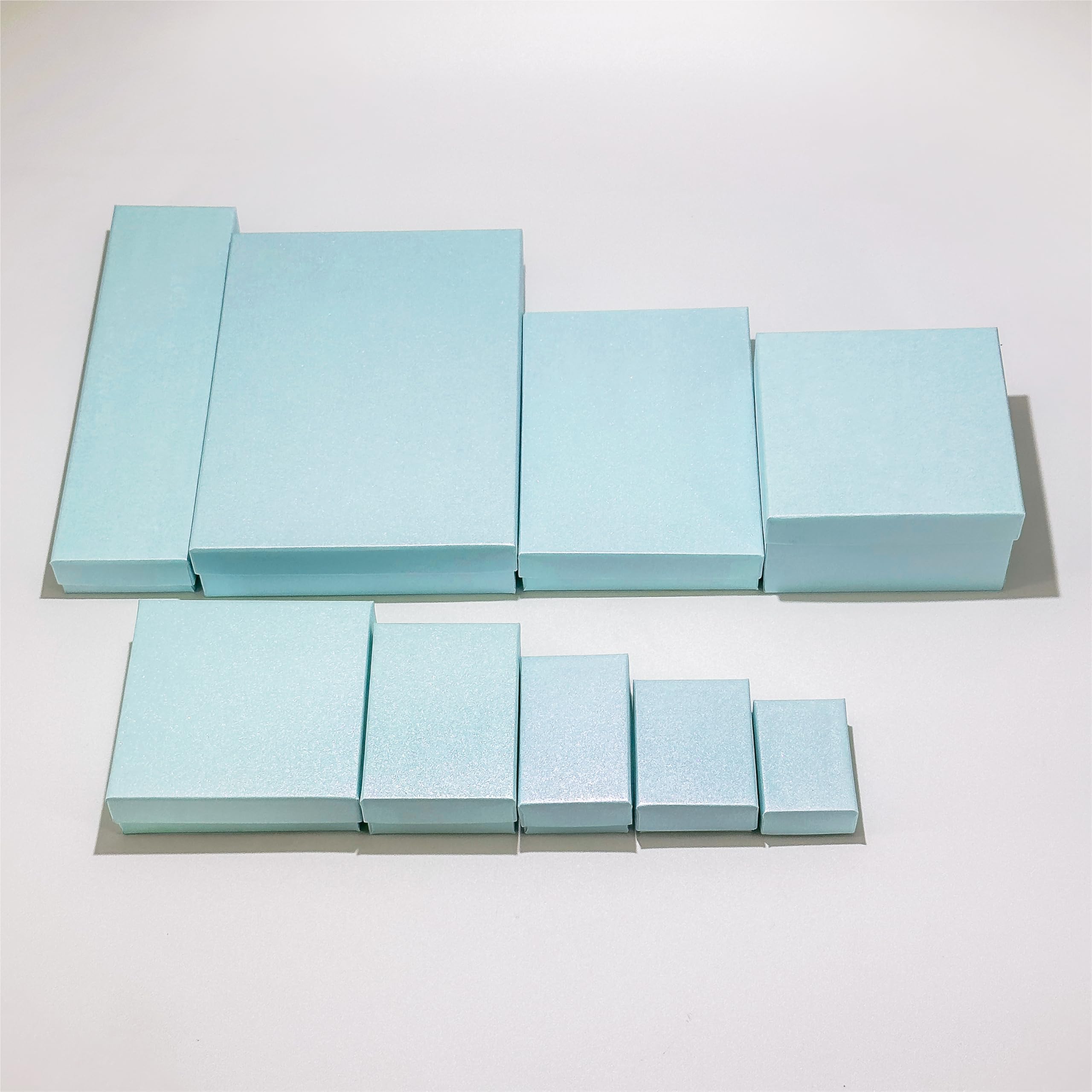 TheDisplayGuys zestaw 100 sztuk #21 kartonowych pudełek na biżuterię wypełniony bawełną pudełko prezentowe - perłowy turkusowy (6,6 cm x 4,1 cm x 2,5 cm) - do wysyłki lub przechowywania