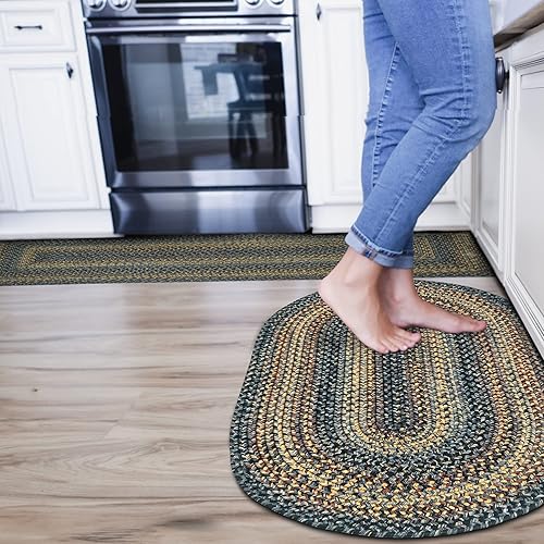 Homespice Alfombra trenzada Black Forest de 27 x 45 pulgadas, ovalada, color negro-gris. Lavable en interiores y exteriores. Usos entrada, cocina,