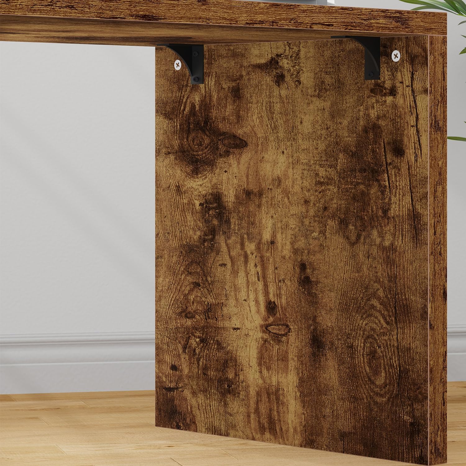 Close-up of the rustic brown laminated surface of the HSH L-Shaped Desk, showing its wood grain texture.