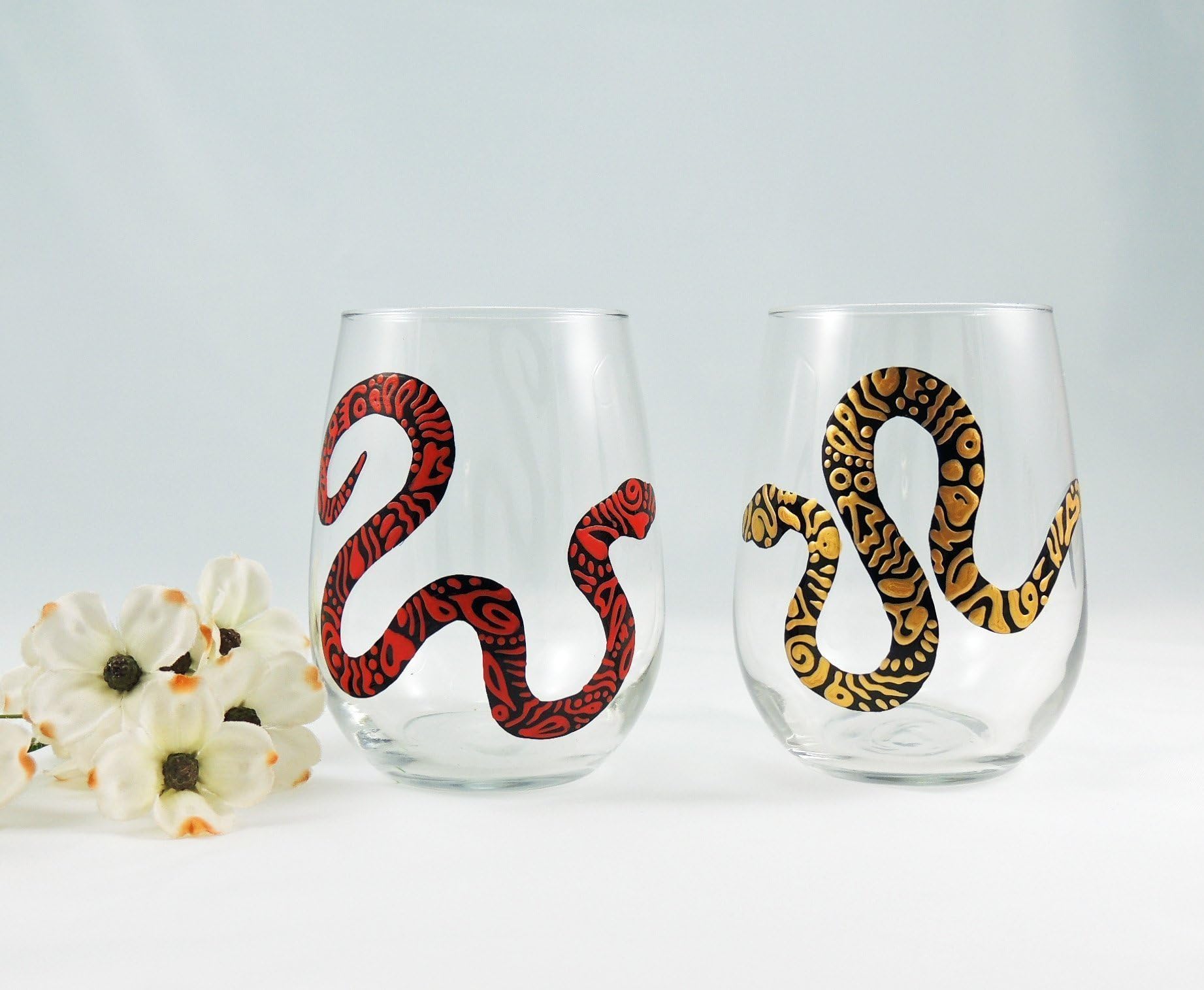 Hand painted stemless snake wine glasses, red and gold