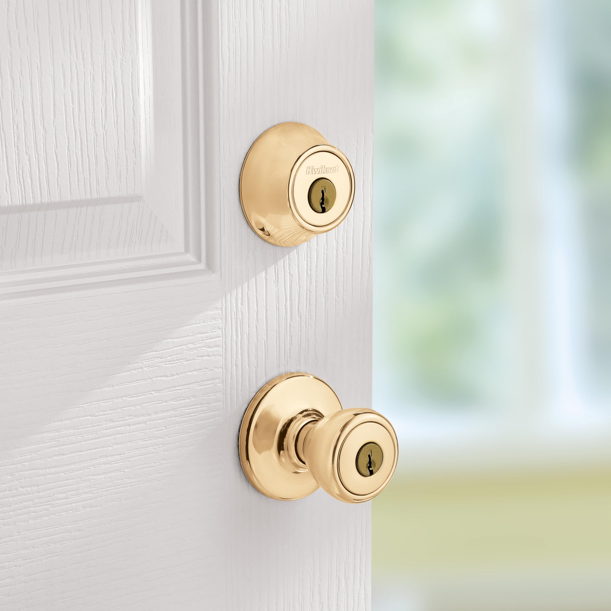 Kwikset 96900-305 - Pomo de entrada con llave de tilo y cilindro único para perno muerto (1 unidad), latón pulido