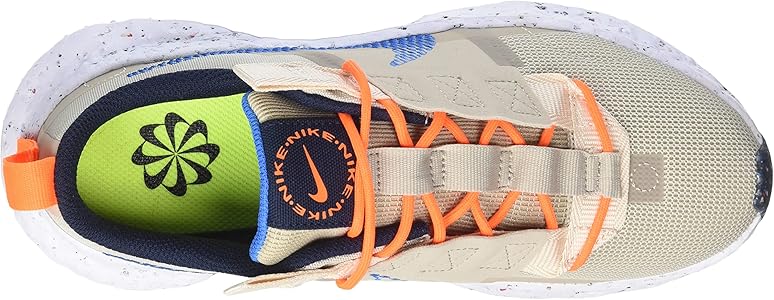 nike crater impact trainers in off white yellow and blue