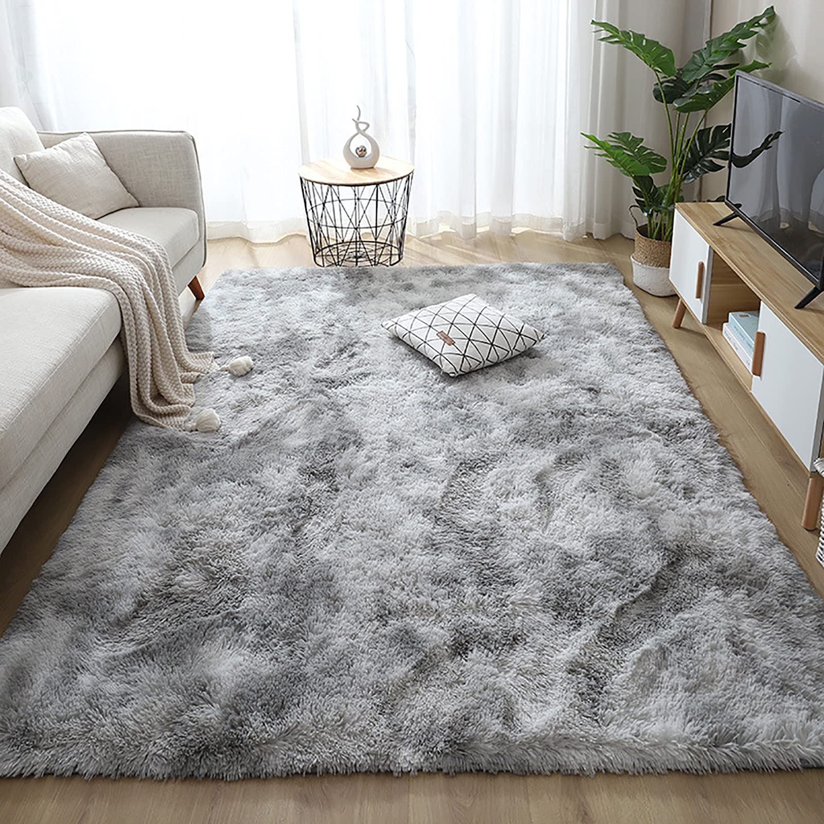Tapis pelucheux super doux pour réchauffer le sol du salon familial