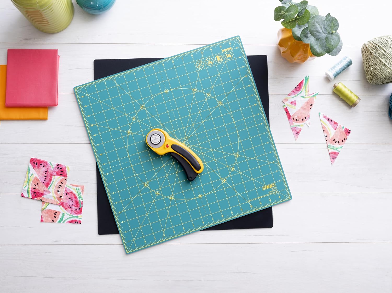 OLFA 17" x 17" Rotating Cutting Mat (RM-17S-01) - Self Healing 17x17 Inch Square Rotary Mat with Grid for Quilting, Sewing, Fabric, & Crafts, Rotates 360 Degrees, Use with Rotary Cutters (Green)