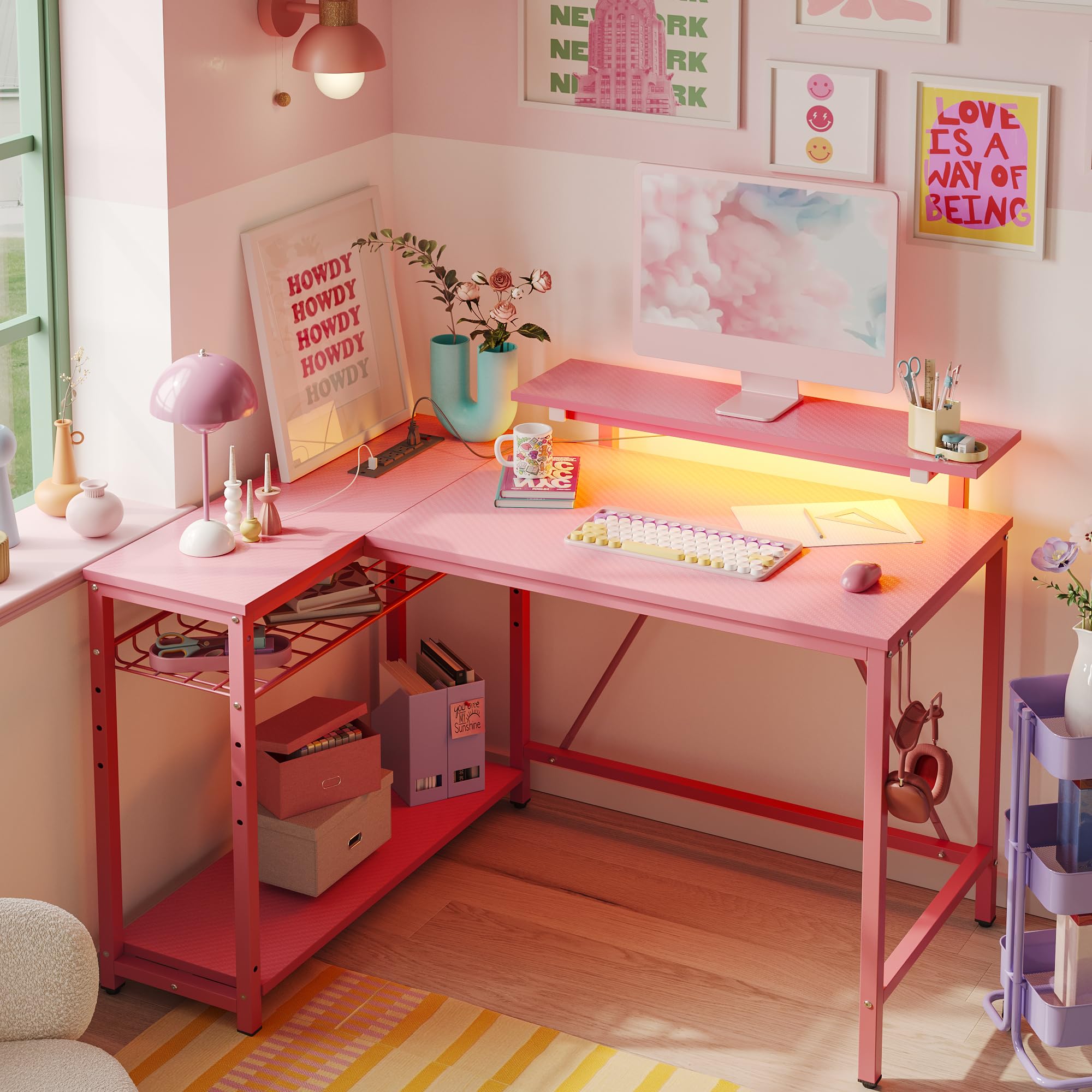 Bestier Small Gaming Desk with Power Outlets,42 L Shaped LED Computer Desk with Reversible Shelves,Corner Gamer Desk with Hooks USB Charging Port,Carbon Fiber PinkClimatePartner certified