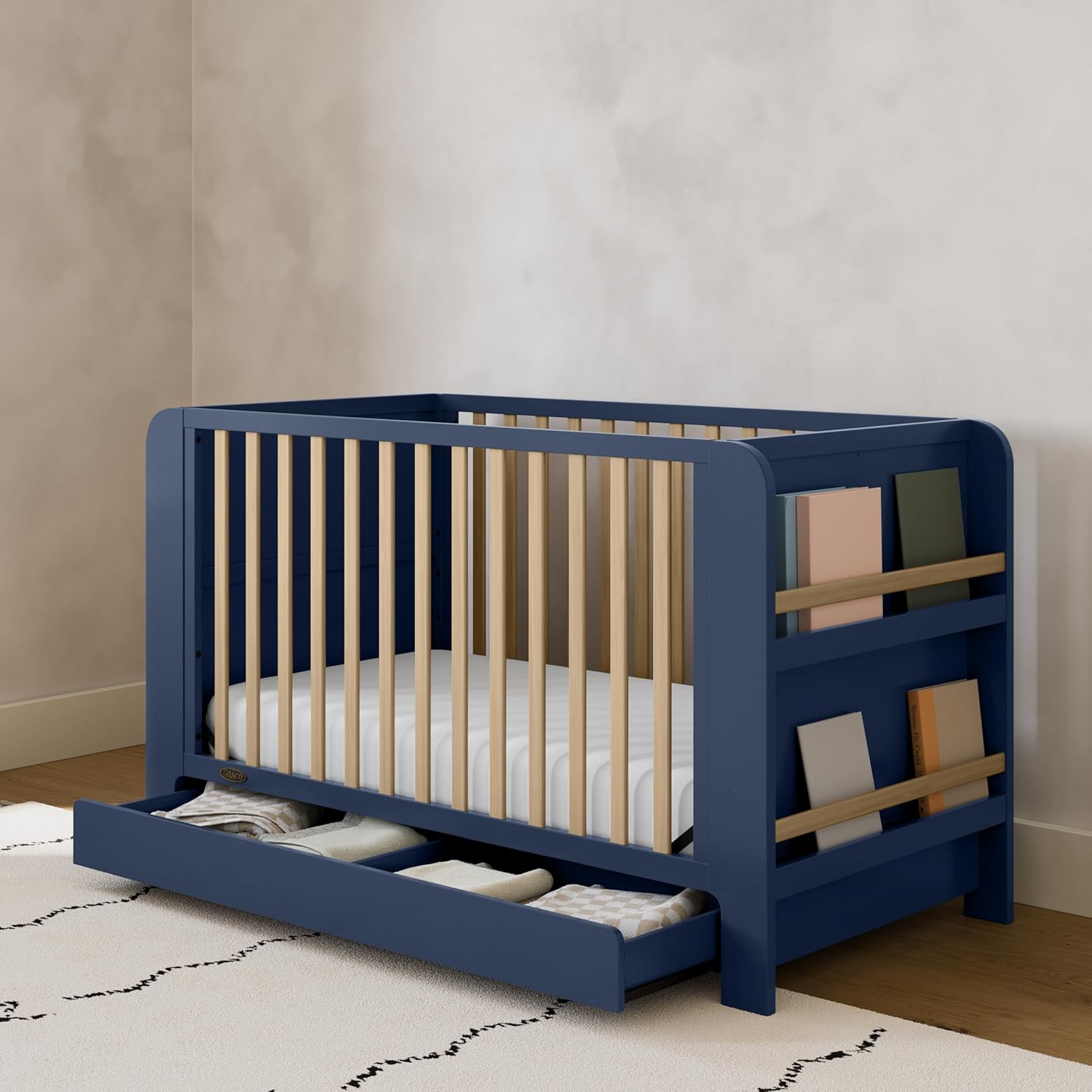 Graco Read-with-Me 4-in-1 Convertible Crib with Drawer - GREENGUARD Gold Certified Converts to Toddler Bed, Daybed, and Functional Bookshelves (Midnight Blue and Driftwood)
