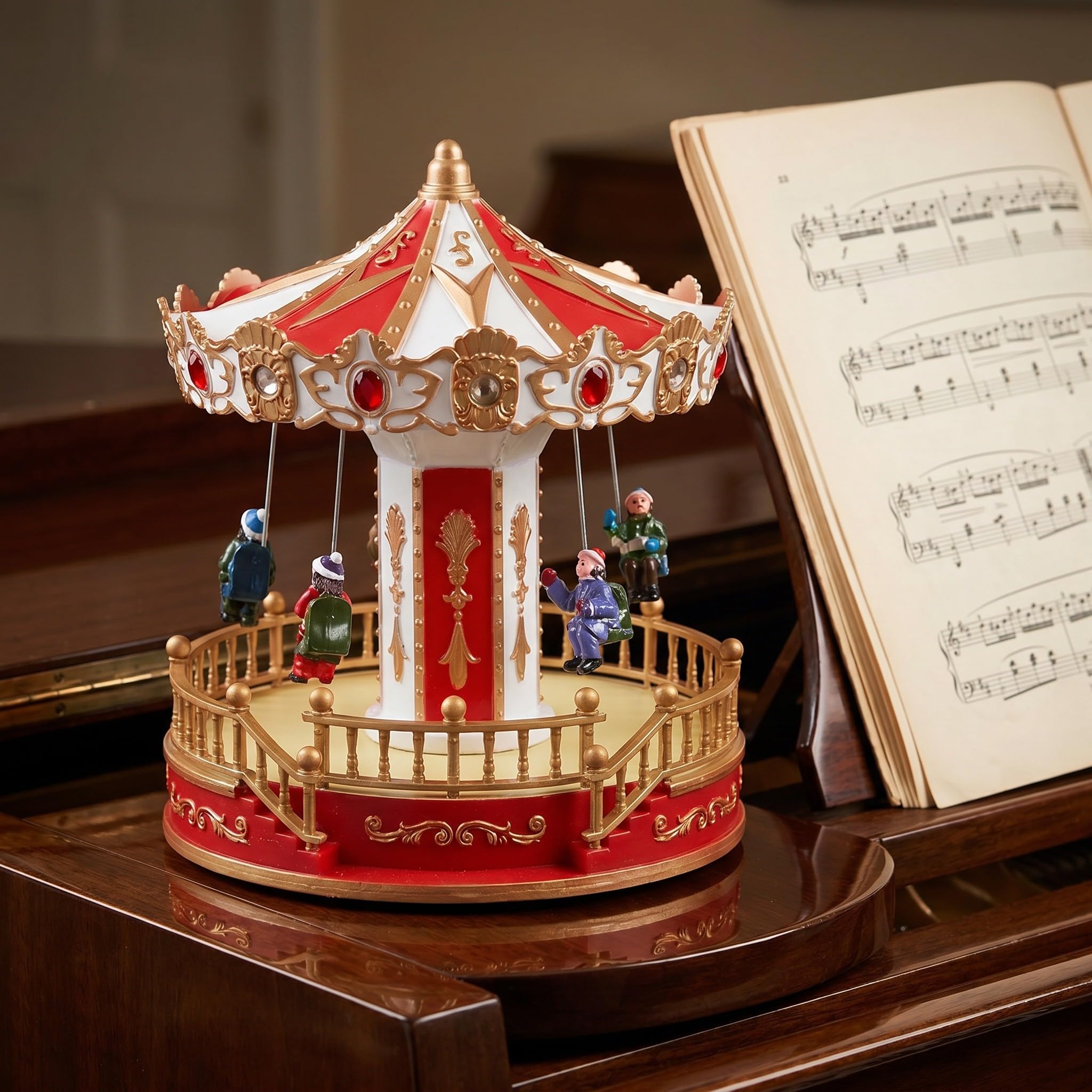TOYANDONA Giostra natalizia illuminata: giostra rotante in resina - Decorazione da tavolo con Babbo Natale a LED e musica - Statuetta musicale a forma di altalena per le feste, ideale per decorare