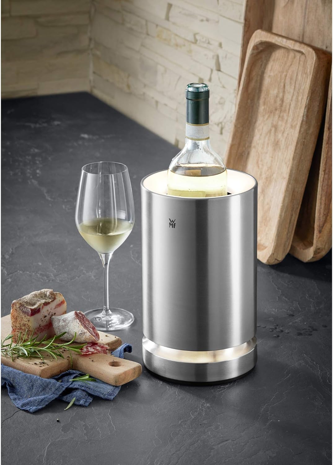 WMF Ambient Electric Bottle Cooler on a table with wine glass and food
