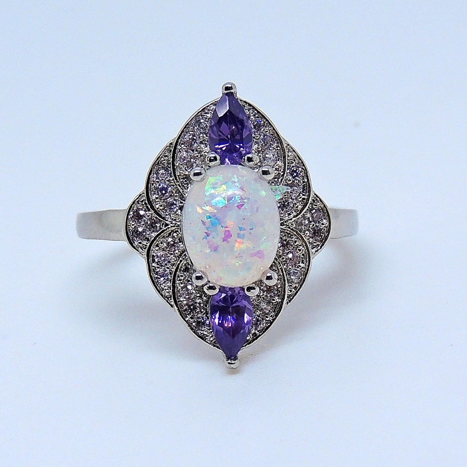 Quinn Halo Statement Ring for Women by Ginger Lyne | Oval Simulated Fire Opal with Purple Cubic Zirconia Accents White Gold Plated All Occasion Ring for Her | Bridal Jewelry for Wife or Girlfriend