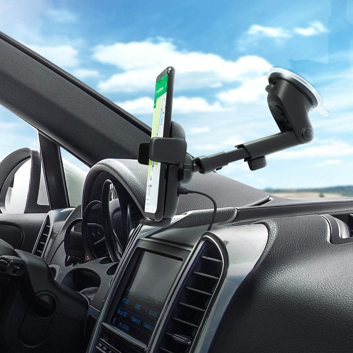 iOttie car mount installed on a car dashboard in portrait orientation