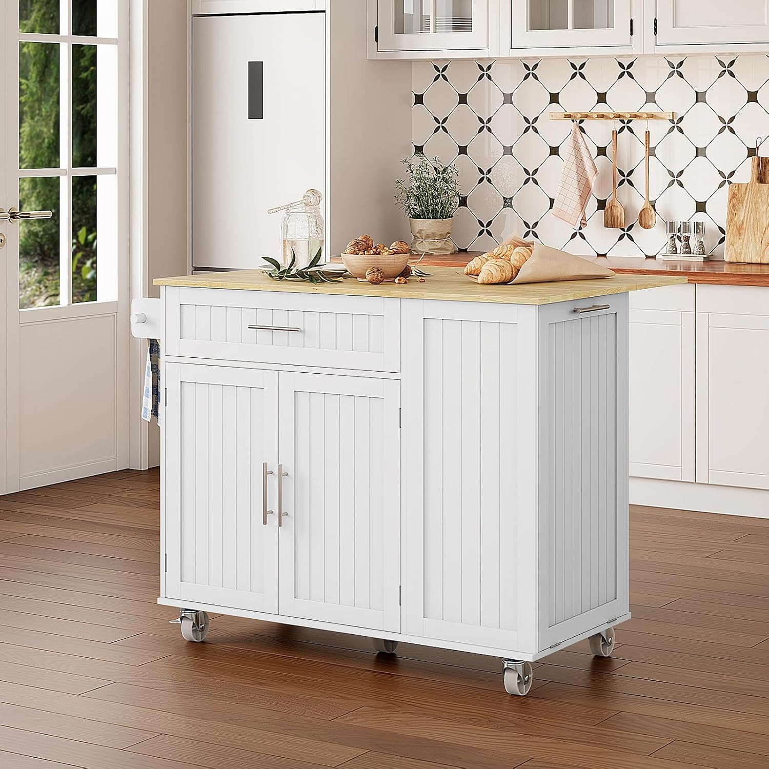 Image showing the tilt-out door for the trash can storage compartment, with a trash can inside.