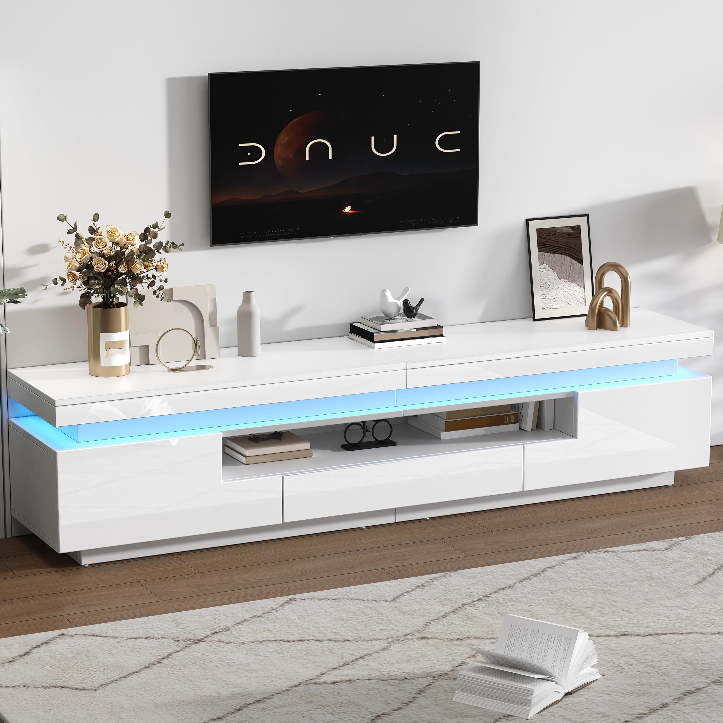 Meuble TV à Haute luminosité avec LED Portes tiroir Panneau Bas pour TV Jusqu’à 75 Pouces Meubles de Base avec Espace de Rangement Semi-Ouvert pour Le Salon Table d’Armoire TV Blanc