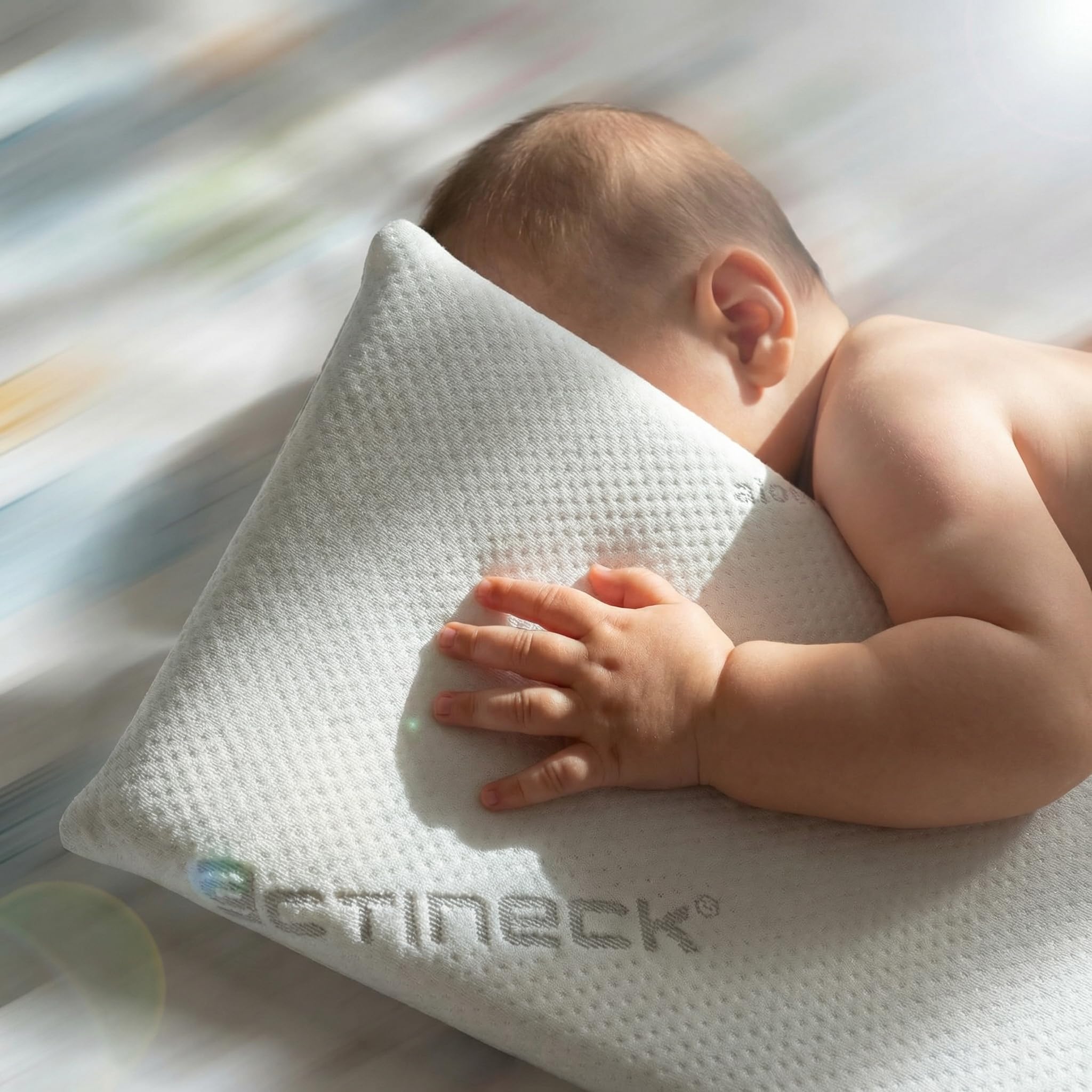 ACTINECK Almohada Bebé Baby 55x30x3cm - Transpirable, Hipoalergénica y Antiescaras - Funda Lavable e Hidrófuga - Fabricada en España para Recién Nacidos