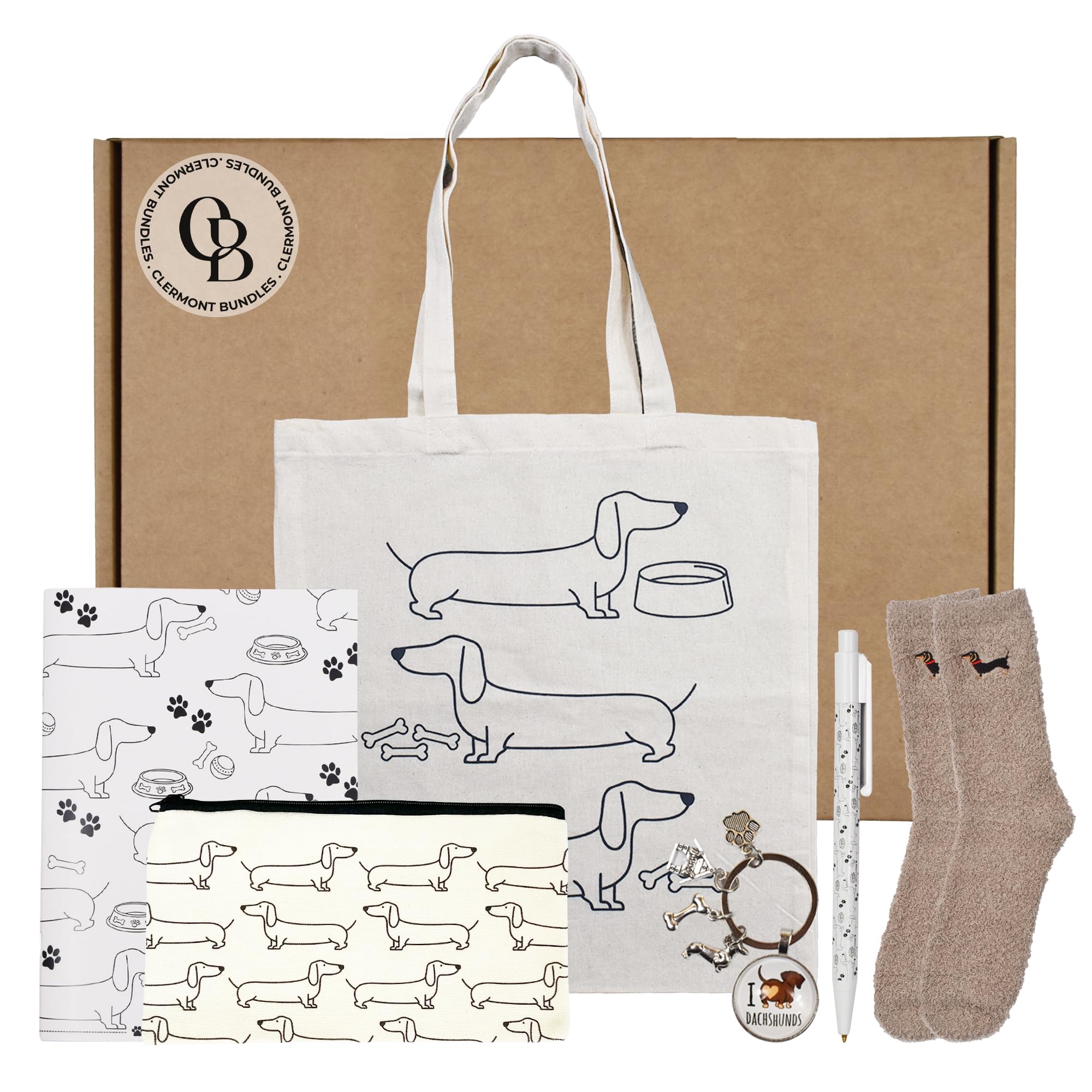 Coffret cadeau teckel pour homme et femme – Panier cadeau en forme de chien saucisse. Livré avec chaussettes, bloc-notes et stylo, porte-clés, trousse de maquillage, sac fourre-tout