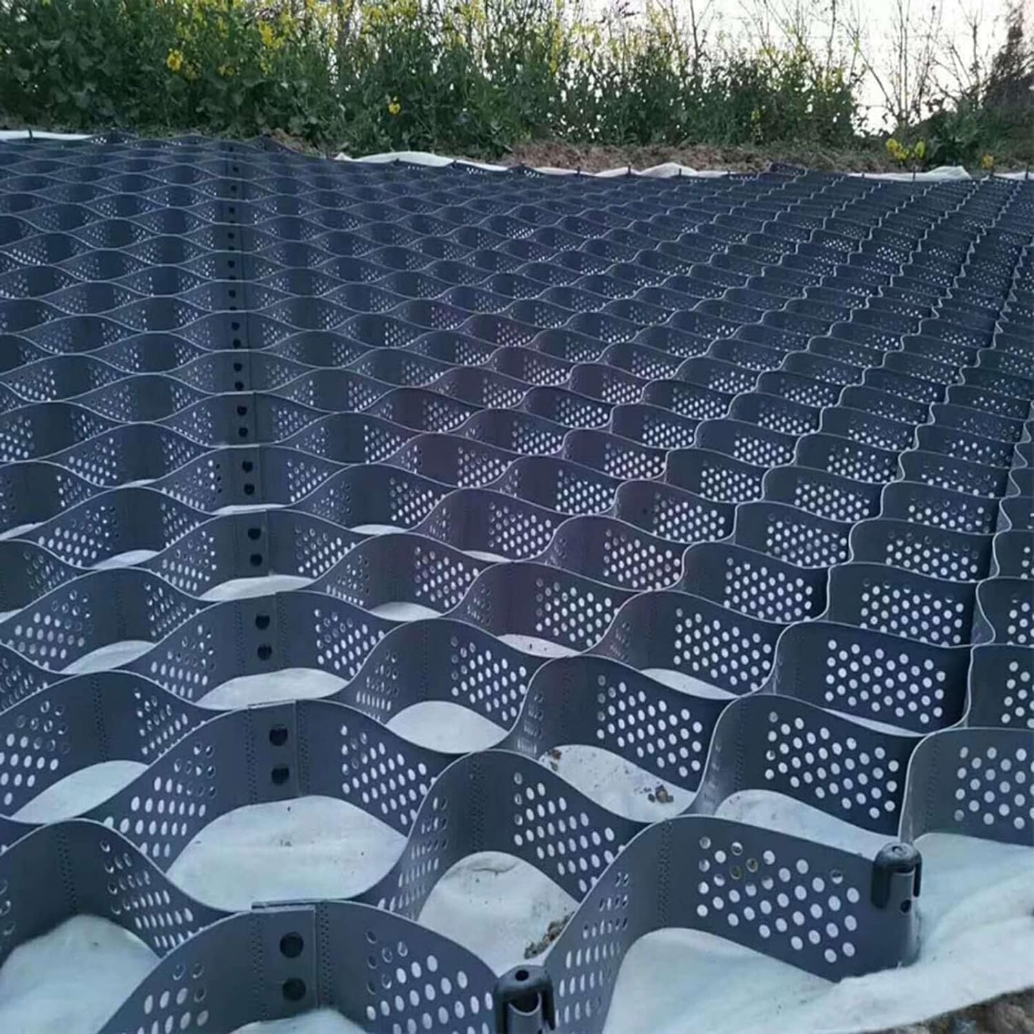 Géogrille de gravier pour allée de garage propre et jardin sans ornières