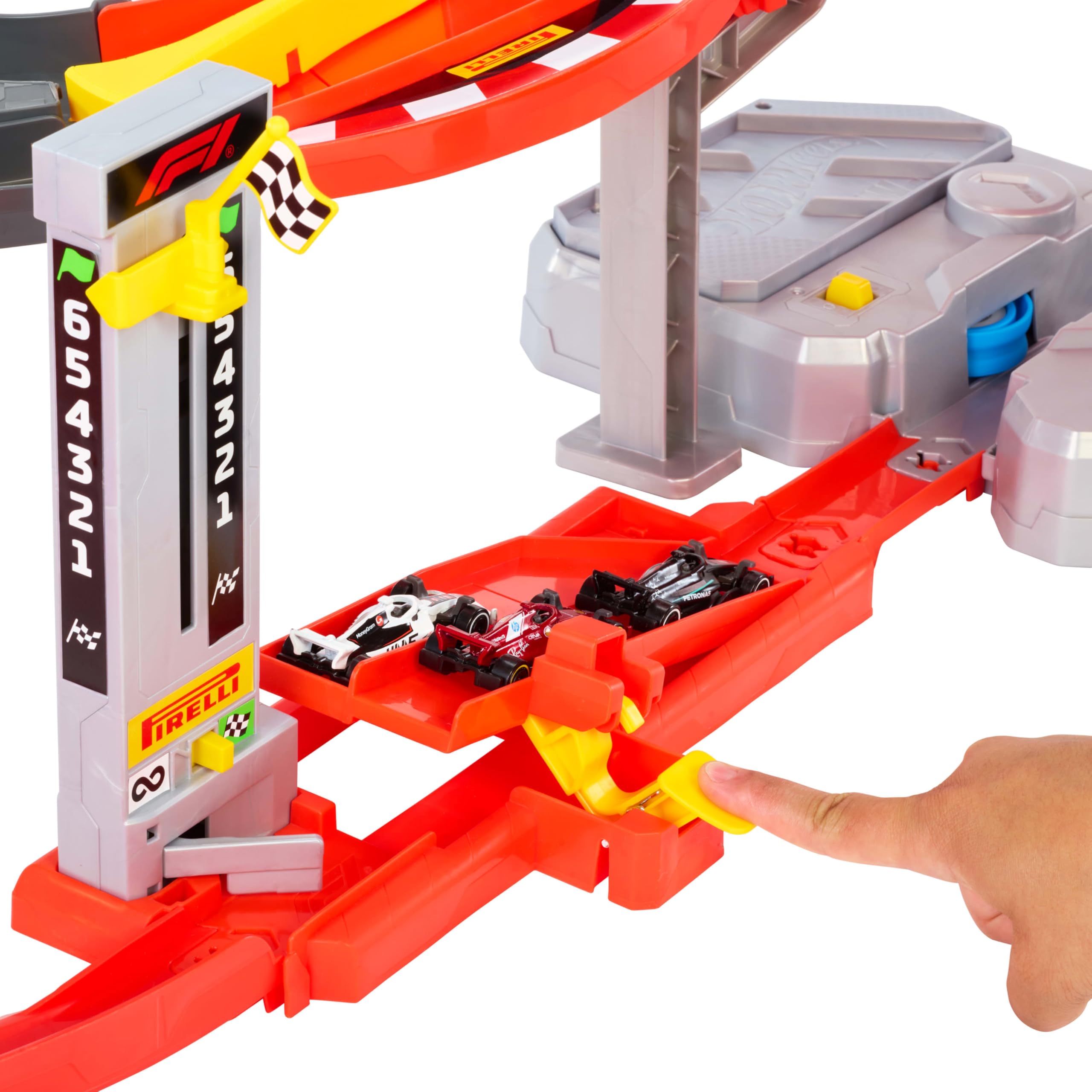 Hot Wheels Racing Formula 1 Super Circuito | Include 3 modelli di auto da corsa F1 in scala 1:64, propulsori manuali, booster motorizzato, sfida testa a testa, JMC90