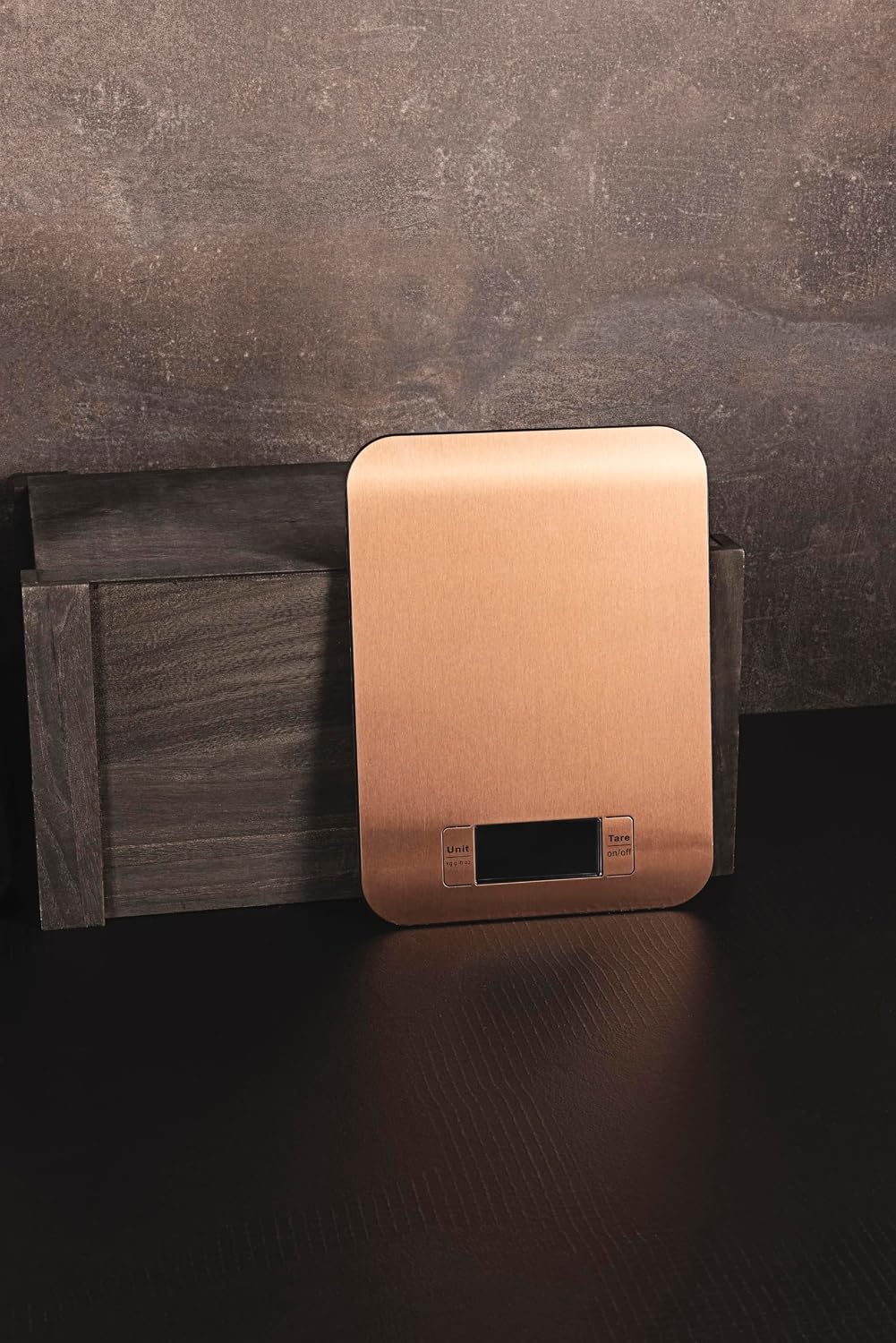 A baix view of the BERGNER COPPER Kitchen Scale showing the battery compartment